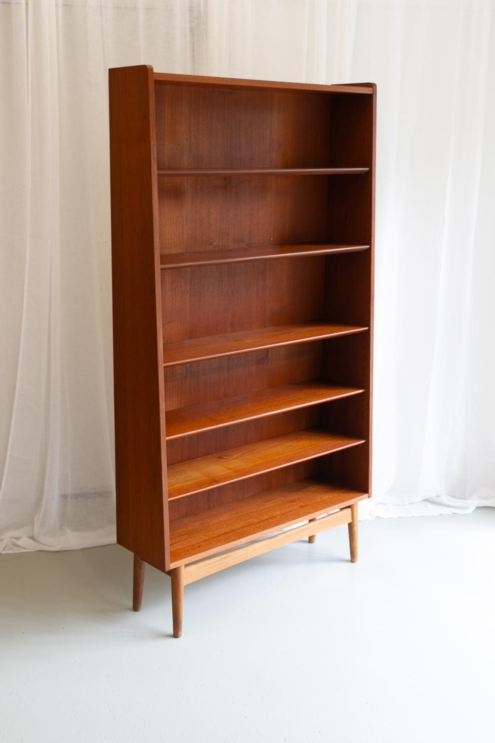 Mid-Century Modern Danish Teak Bookcase by Johannes Sorth for Nexø Møbelfabrik, 1960s.

This Classic Scandinavian Modern bookcase was designed by Danish master carpenter Johannes Sorth for Nexø Møbelfabrik, Bornholm, Denmark. 
The idea was to create