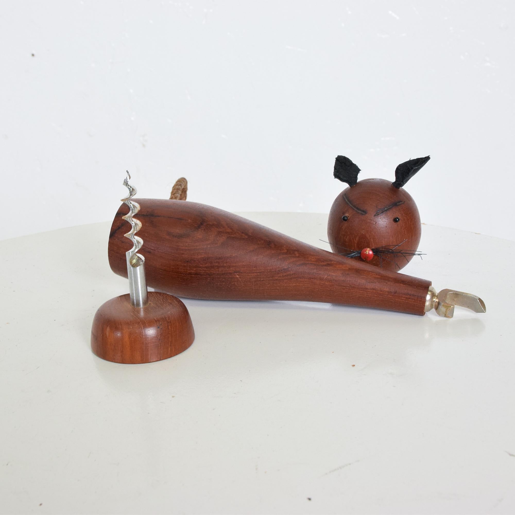 Danish modern teak bottle opener cat figure from Denmark, 1960s
Similar to Scandinavian designs of Kay Bojesen and Hans J Wegner. Teak with oiled rope leather ears Scandinavian modern. Unmarked. No label. Adorable piece.
Dimensions: 8.75 tall x