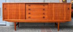 Danish Modern Teak Buffet / Credenza with Centre Drawers and Sword Blade Legs
