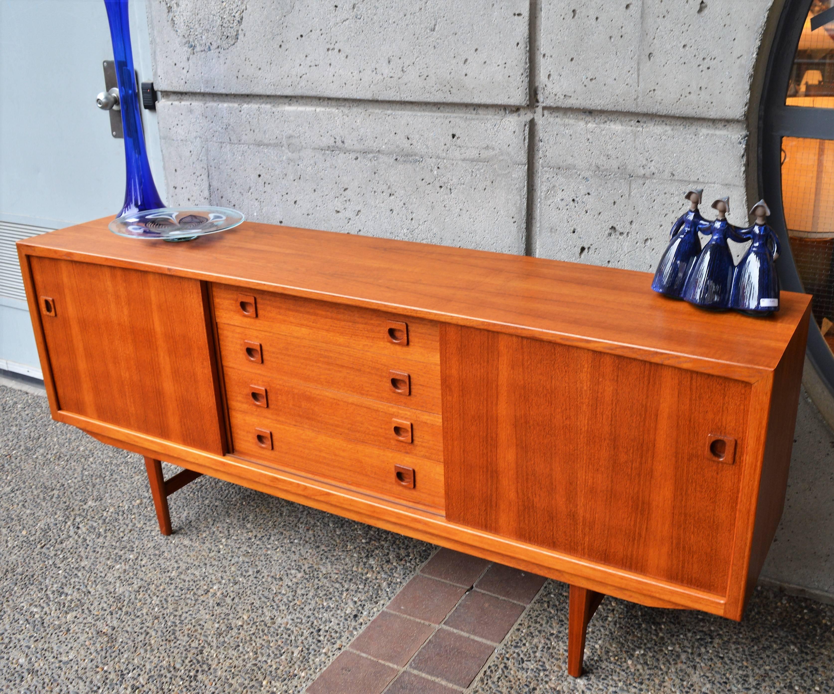 Mid-Century Modern Danish Modern Teak Buffet / Credenza with Centre Drawers and Sword Blade Legs