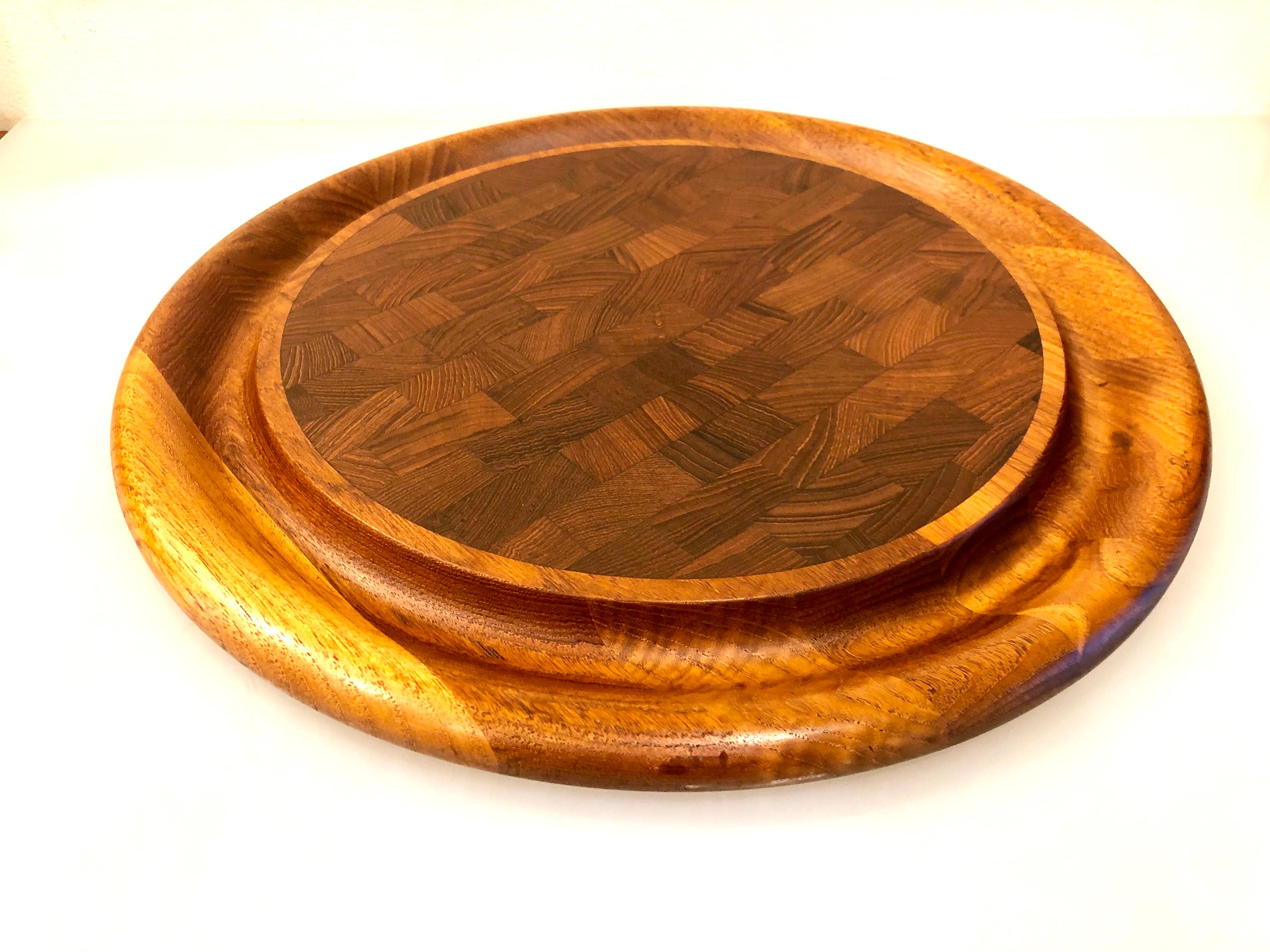 Beautiful solid teak large tray for cheese with edge for placing the crackers, nice condition early production made in Denmark.
    