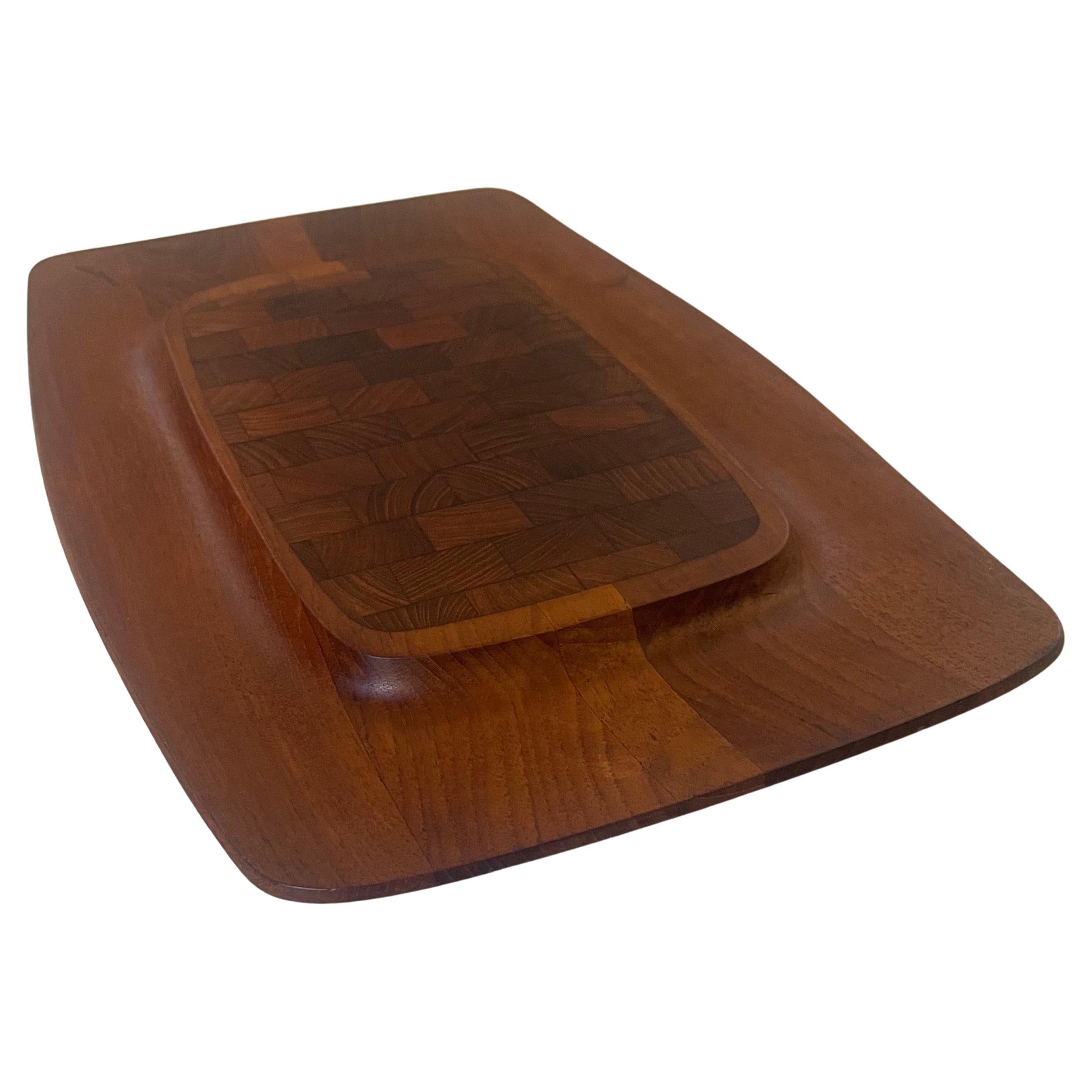 Danish modern teak butcher block cutting board / cheese tray by Jens Quistgaard for Dansk, circa 1960s. The piece is in good vintage condition and measures 19
