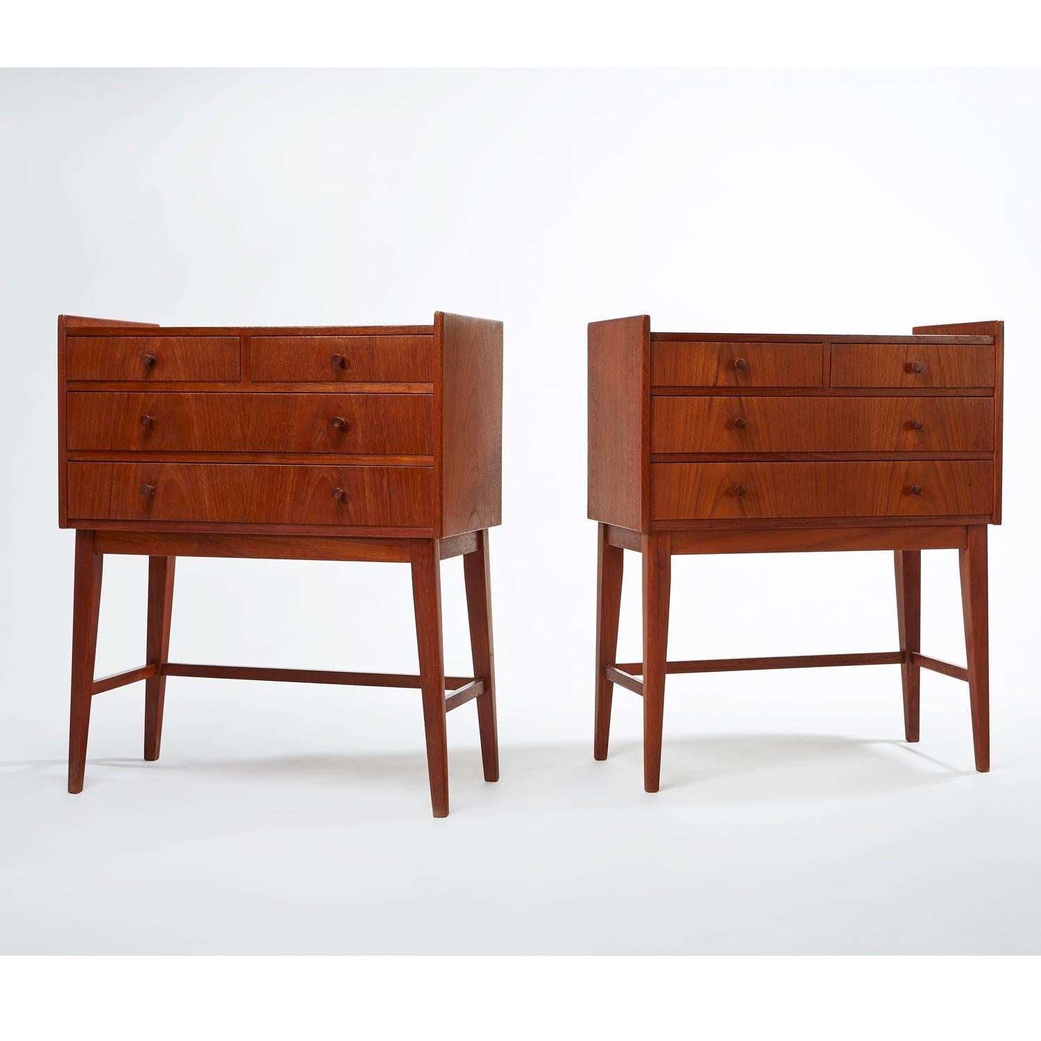 Pair of early Mid-Century Modern Scandinavian teak nightstands, or petite chest of drawers. Each chest features a set of three drawers, the top is divided to create two smaller drawers, which make for great jewelry storage. The diminutive size,