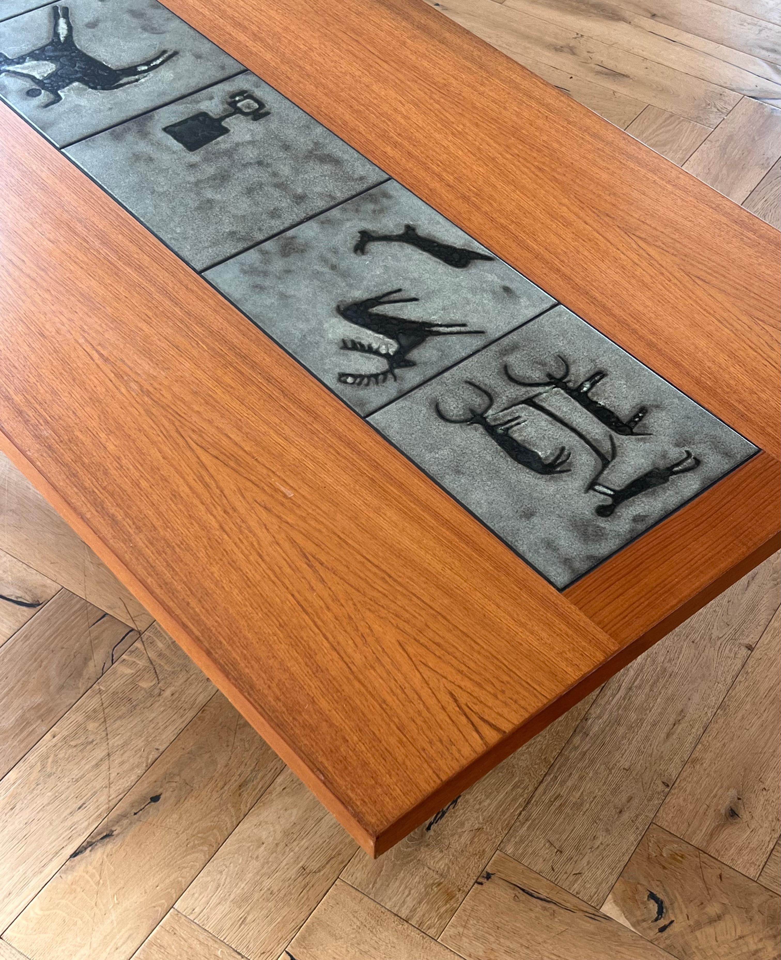 Danish modern teak coffee table with prehistoric tile inlay, 1960s For Sale 10