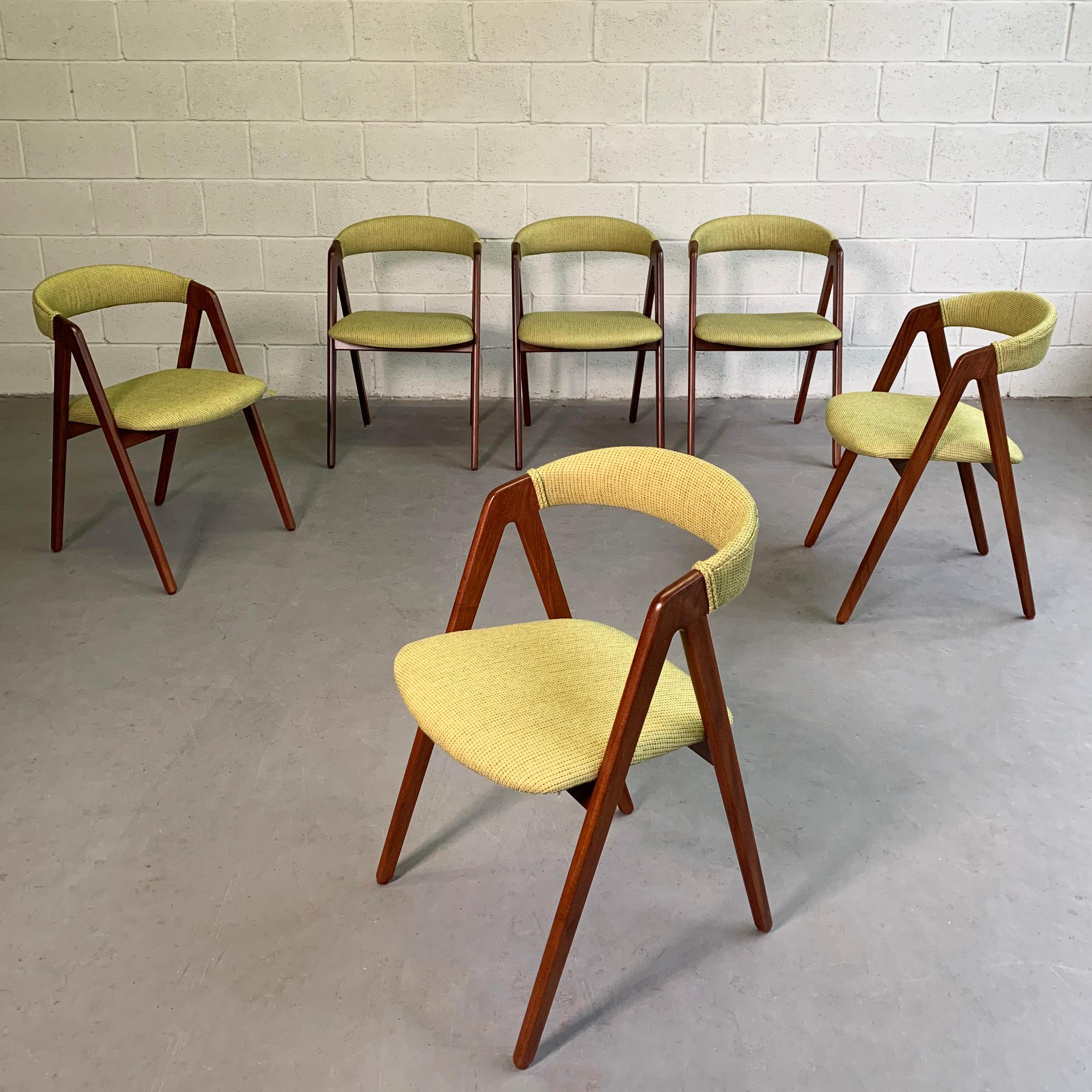 Set of 6, Scandinavian Modern, teak compass dining chairs by Kai Kristiansen with chartreuse, woven cotton upholstered seats and backs. The chairs feature elegant, minimal lines with scoop backs at just about table height.