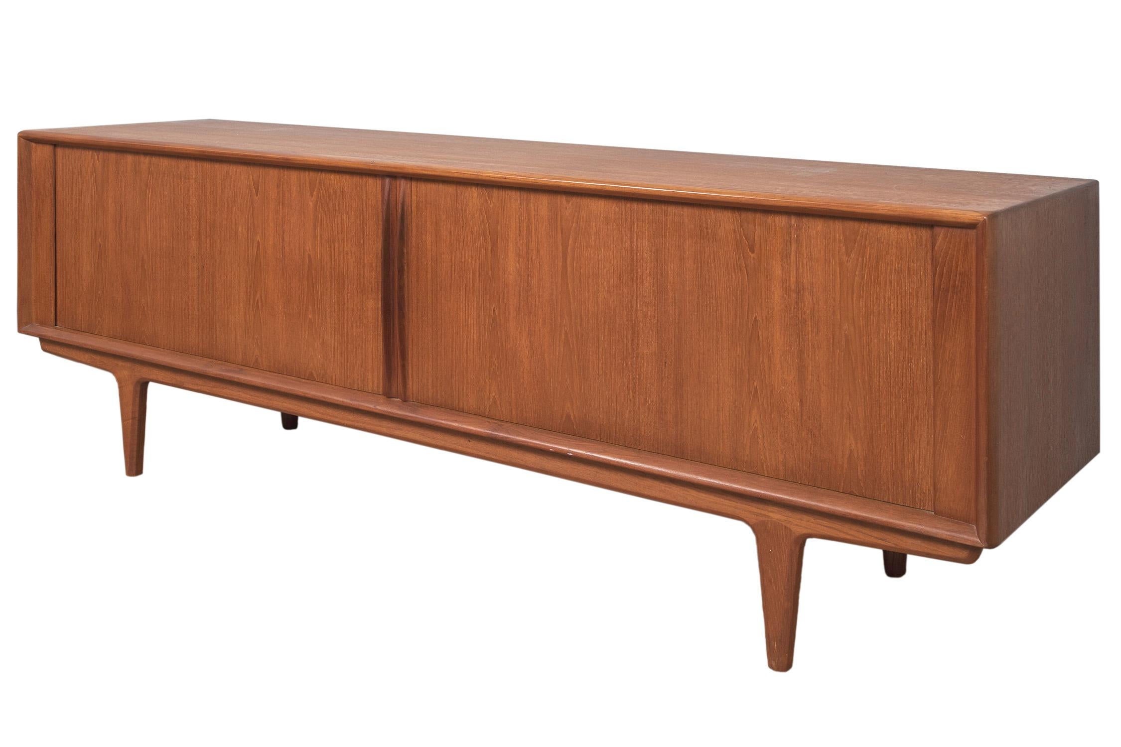 This classic and beautifully made tambour door teak credenza is by Pedersen & Son of Denmark and designed by Bernhard Pedersen.