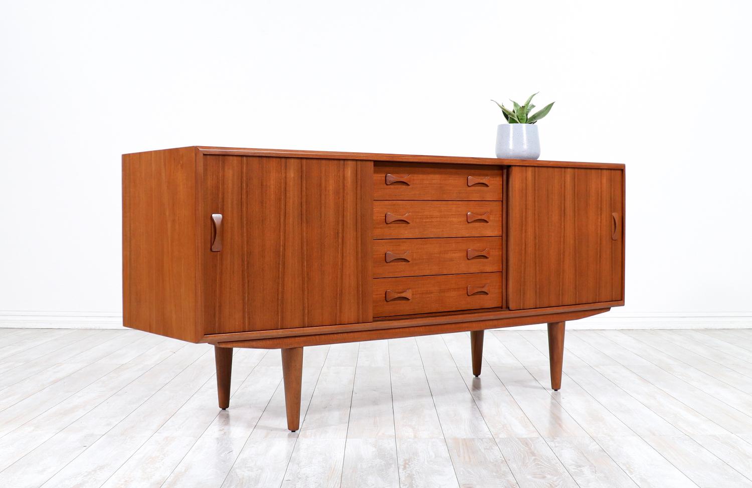 Mid-20th Century Danish Modern Teak Credenza with Bowtie Style Pulls by Clausen & Søn