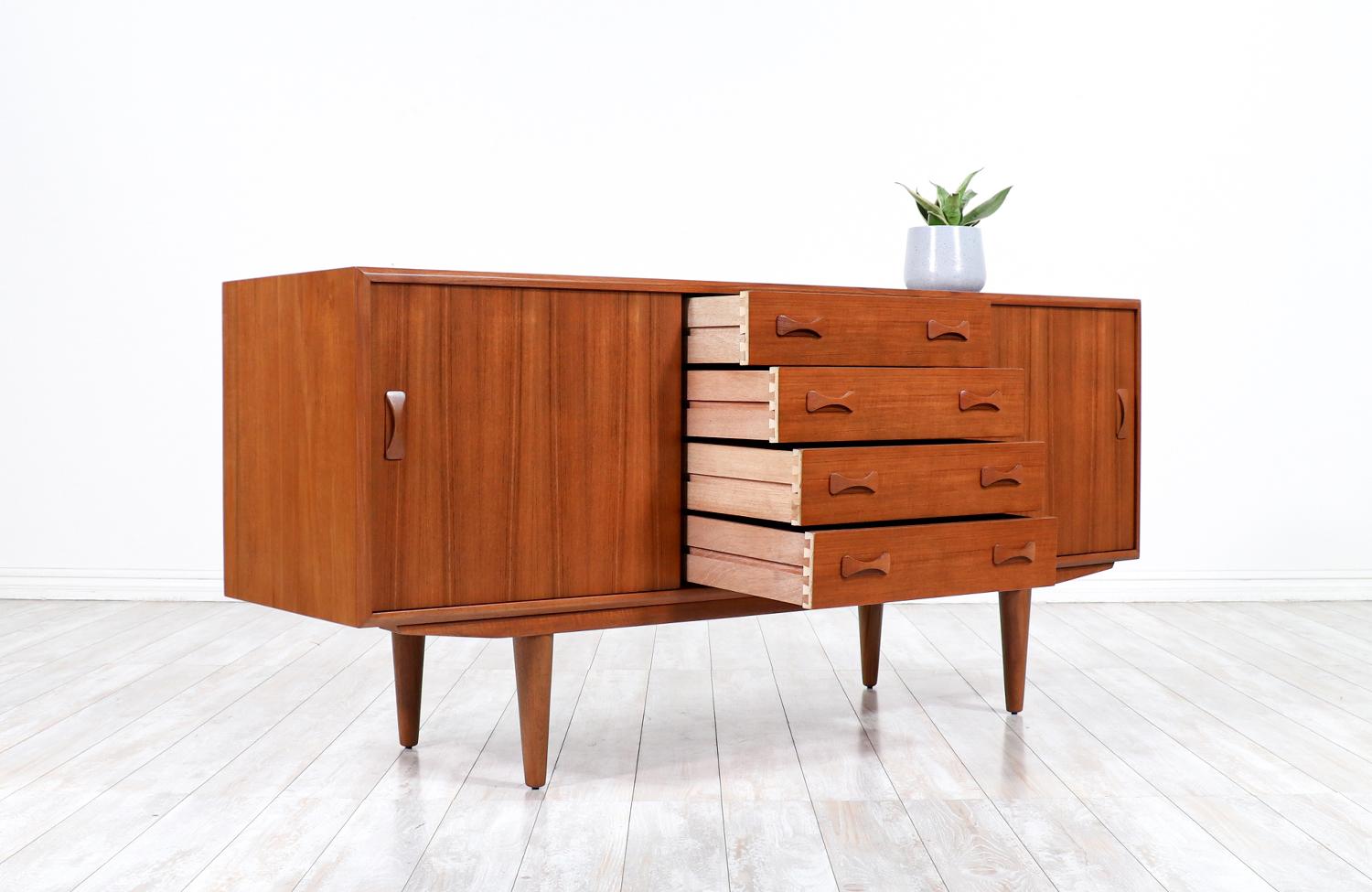 Wood Danish Modern Teak Credenza with Bowtie Style Pulls by Clausen & Søn