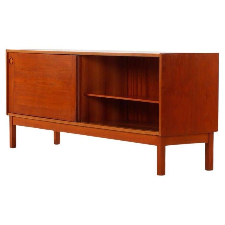 Woodwork Danish Modern teak credenza with sliding doors by ib Kofod Larsen For Sale