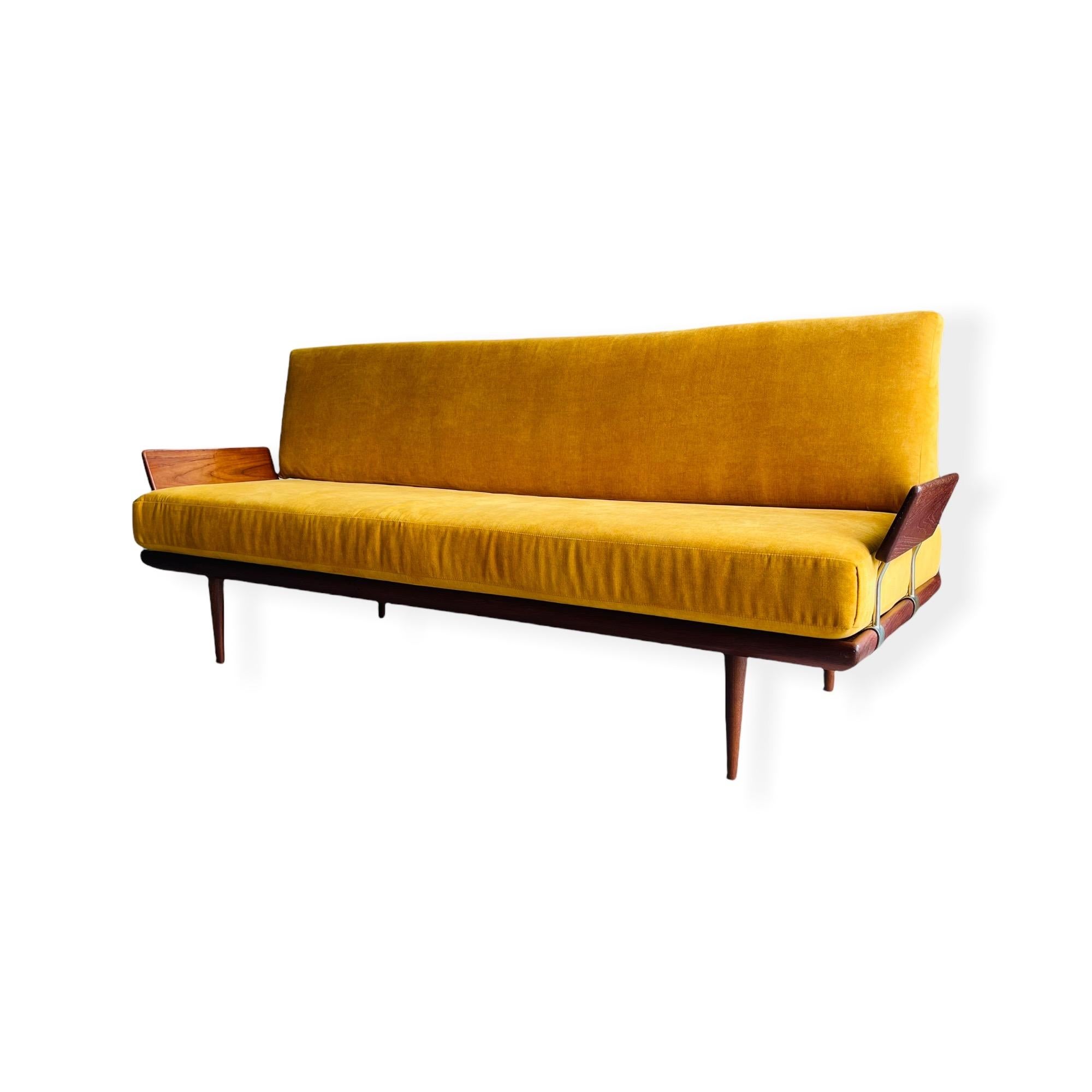 Here is a stunning classic Mid-Century Danish Modern teak Daybed / Sofa designed by Peter Hvidt and Orla Mølgaard-Nielsen for France and Son Denmark. This highly collectible sofa/daybed was fully reupholstered and has brand new foam installed. This