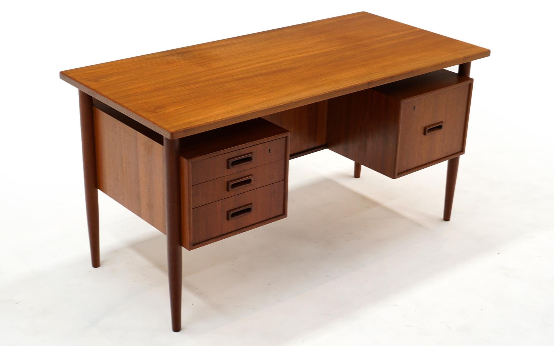 Danish Modern Teak Desk by H.P. Hansen, Floating Top, Drawers and Bookcase Front In Good Condition In Kansas City, MO