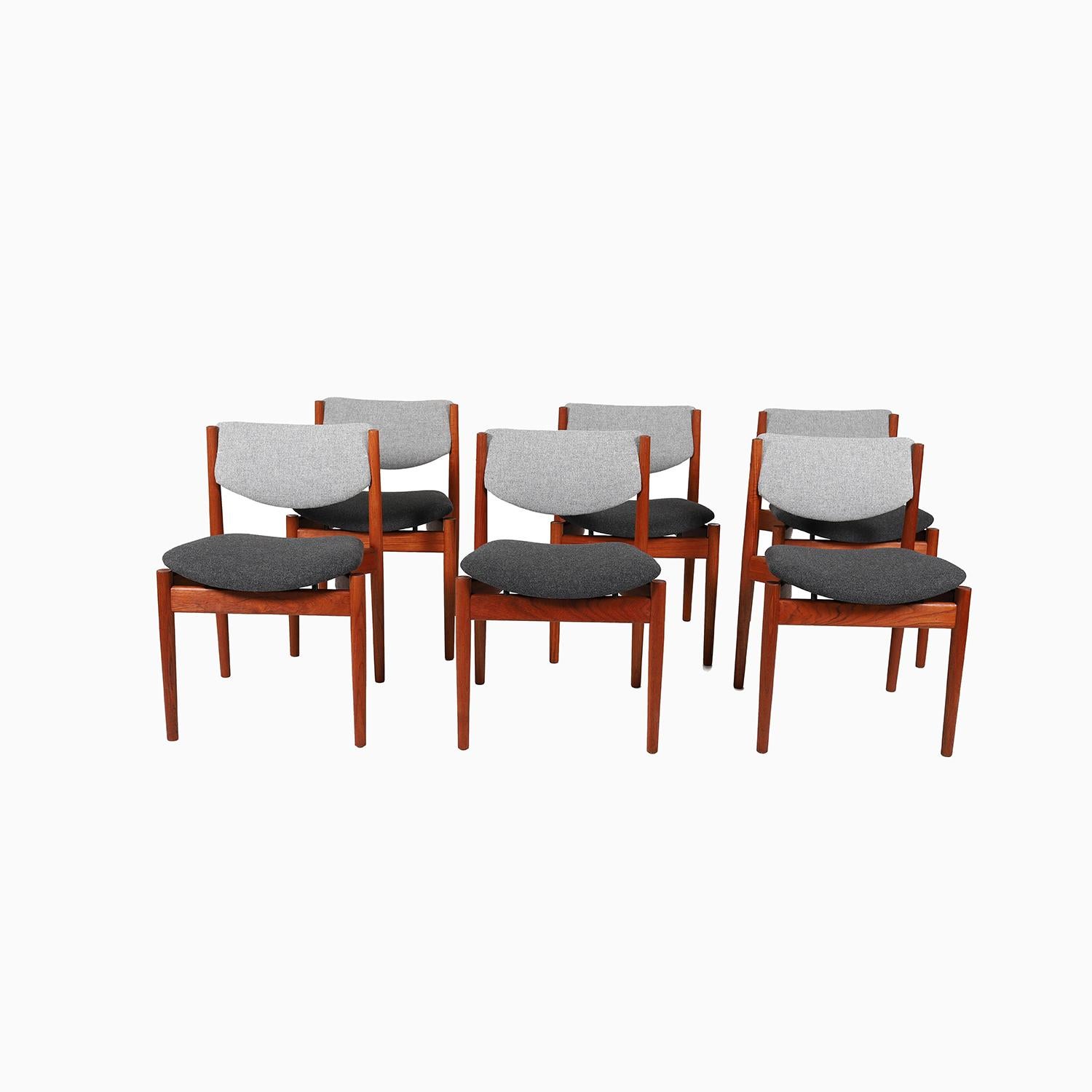 A set of six vintage original Scandinavian Modern Classic dining chairs designed by Finn Juhl for France & Son. Old growth teak frames with turned legs and crescent shaped side rails. Newly upholstered in a two toned Kvadrat 