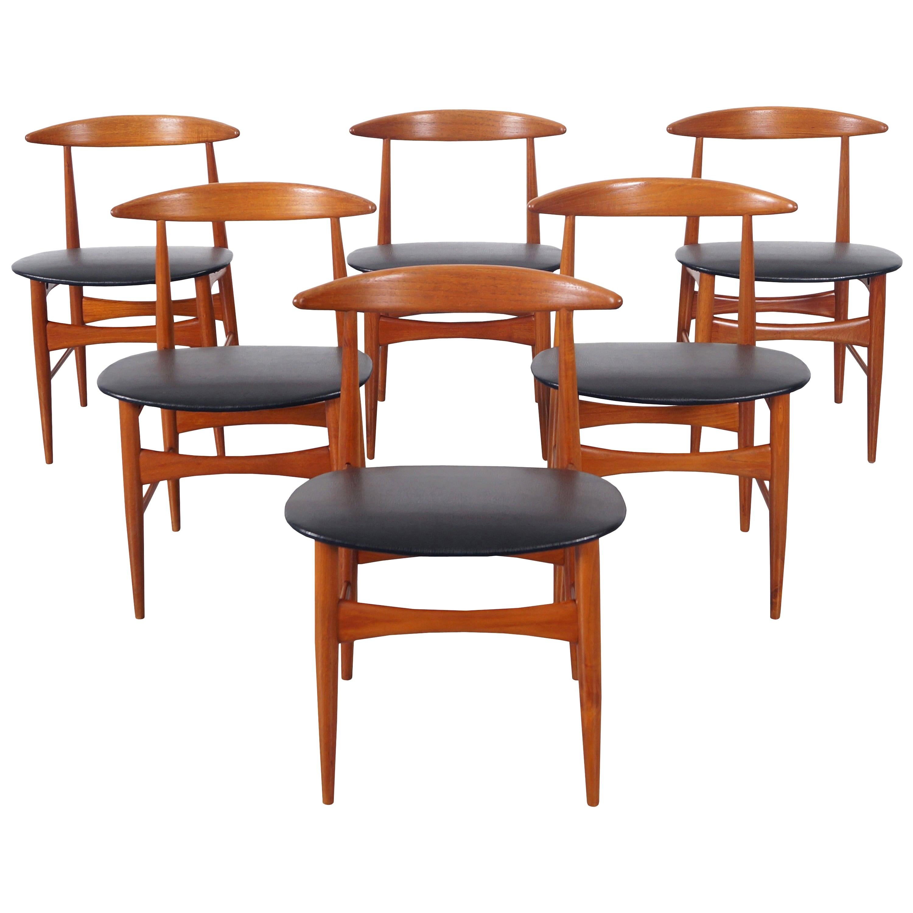 Danish Modern Teak Dining Chairs by Mogens Kold