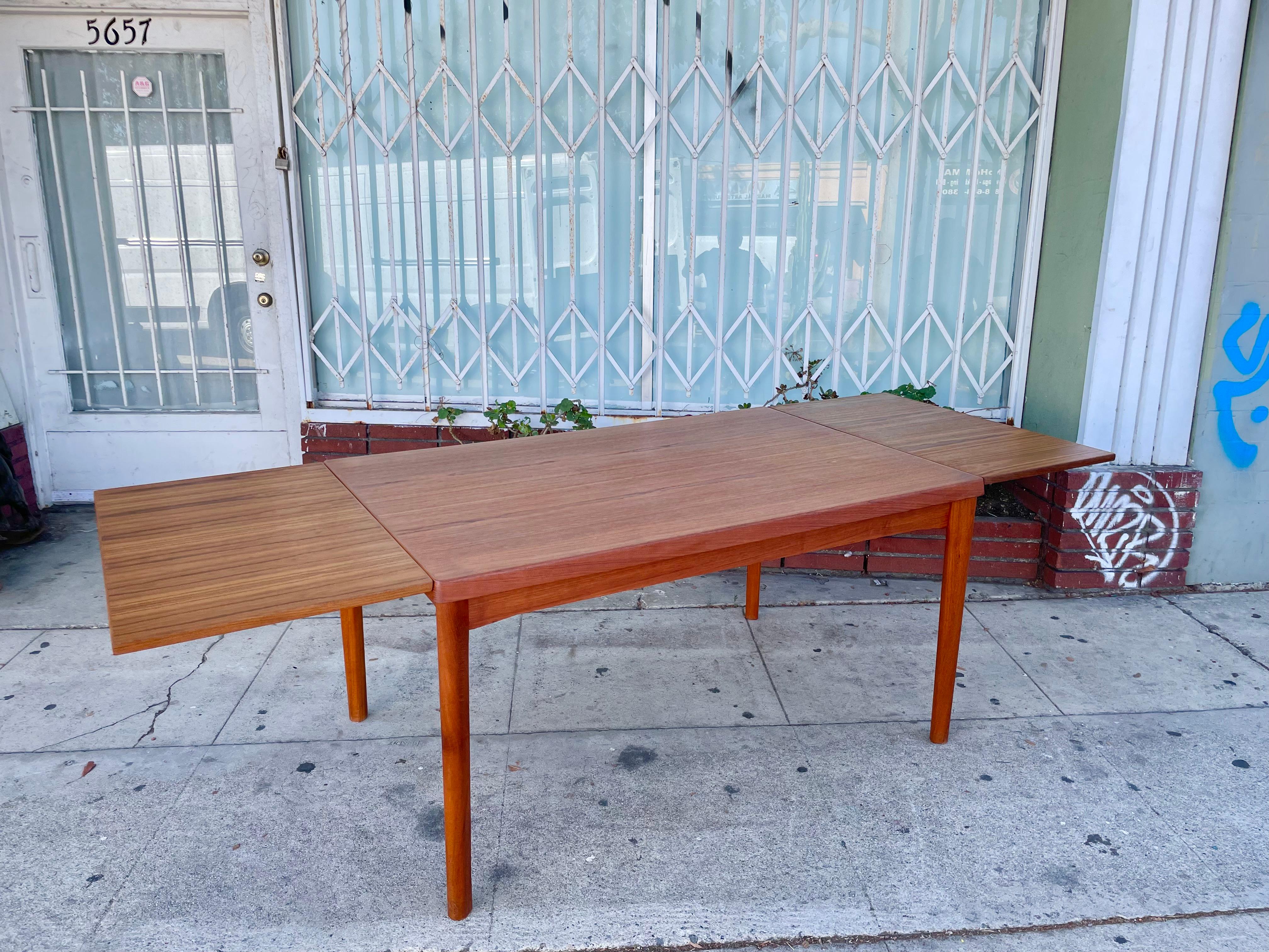 Mid-20th Century Danish Modern Teak Dining Table by Henning Kjaernulf