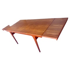 Danish Modern Teak Dining Table With 2 Pull-out Leaves by Johannes Andersen