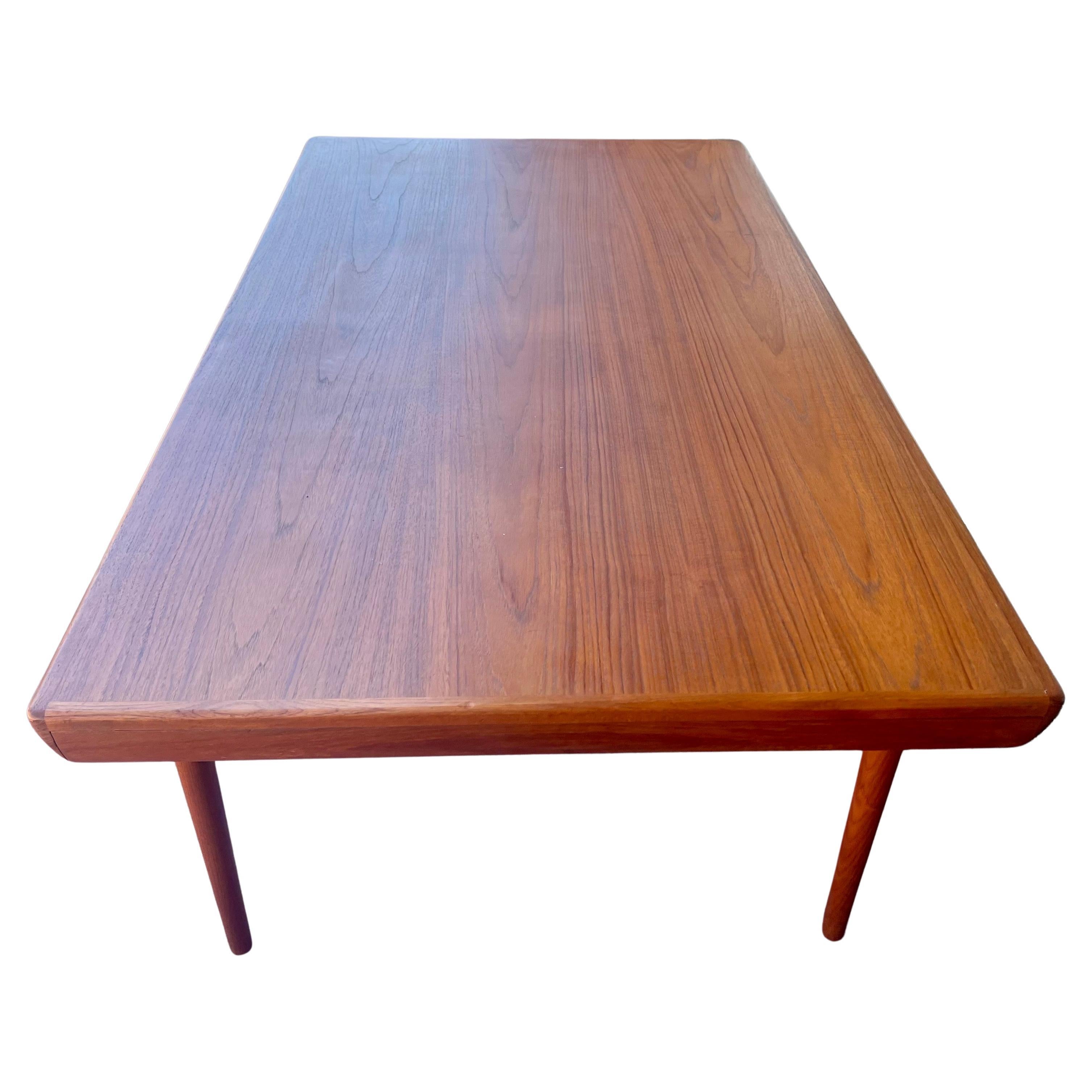 Scandinavian Modern Danish Modern Teak Dining Table With 2 Pull-out Leaves by Johannes Andersen For Sale