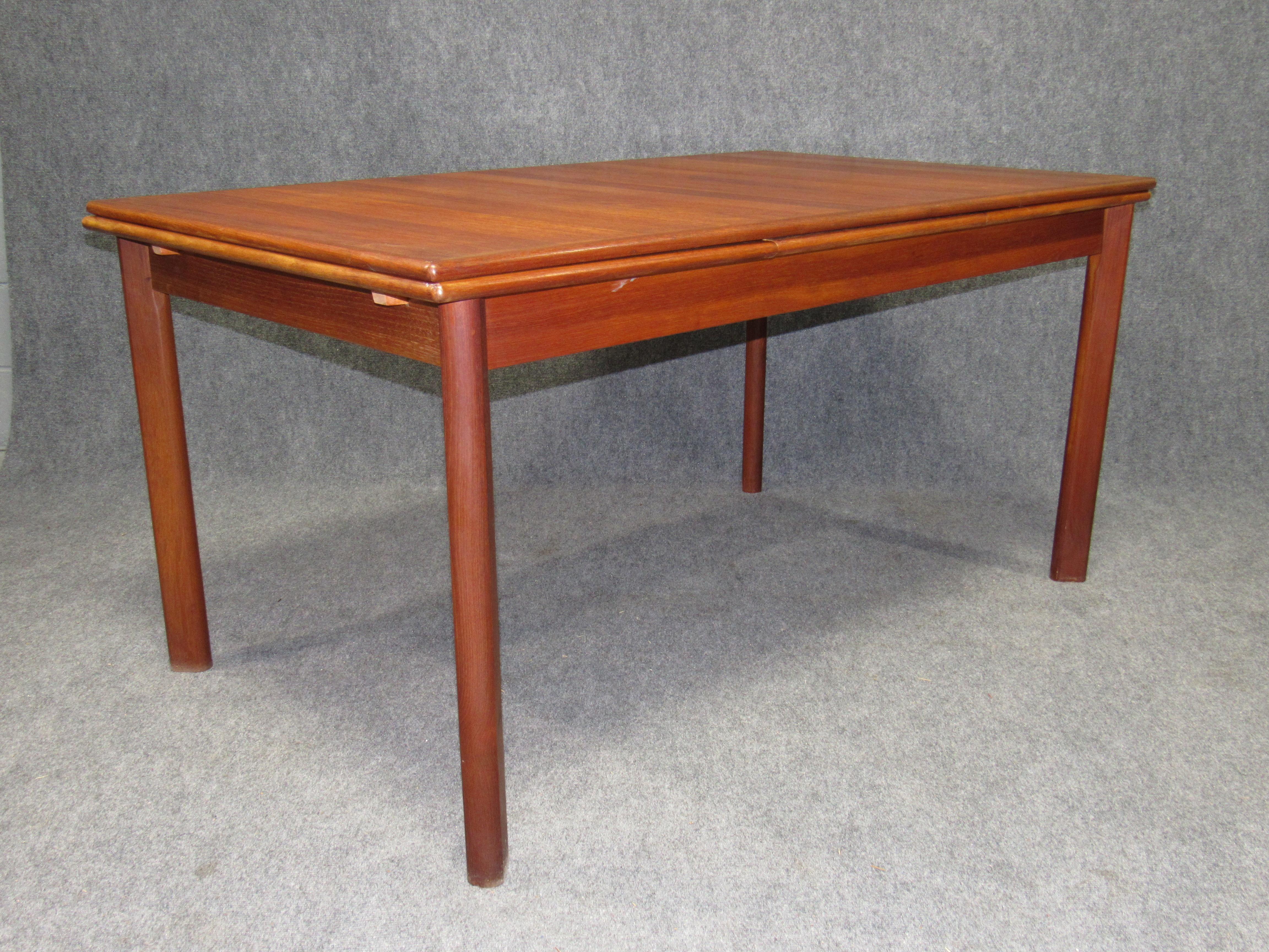 Mid-20th Century Danish Modern Teak Dining Table with Pull Out Leaves