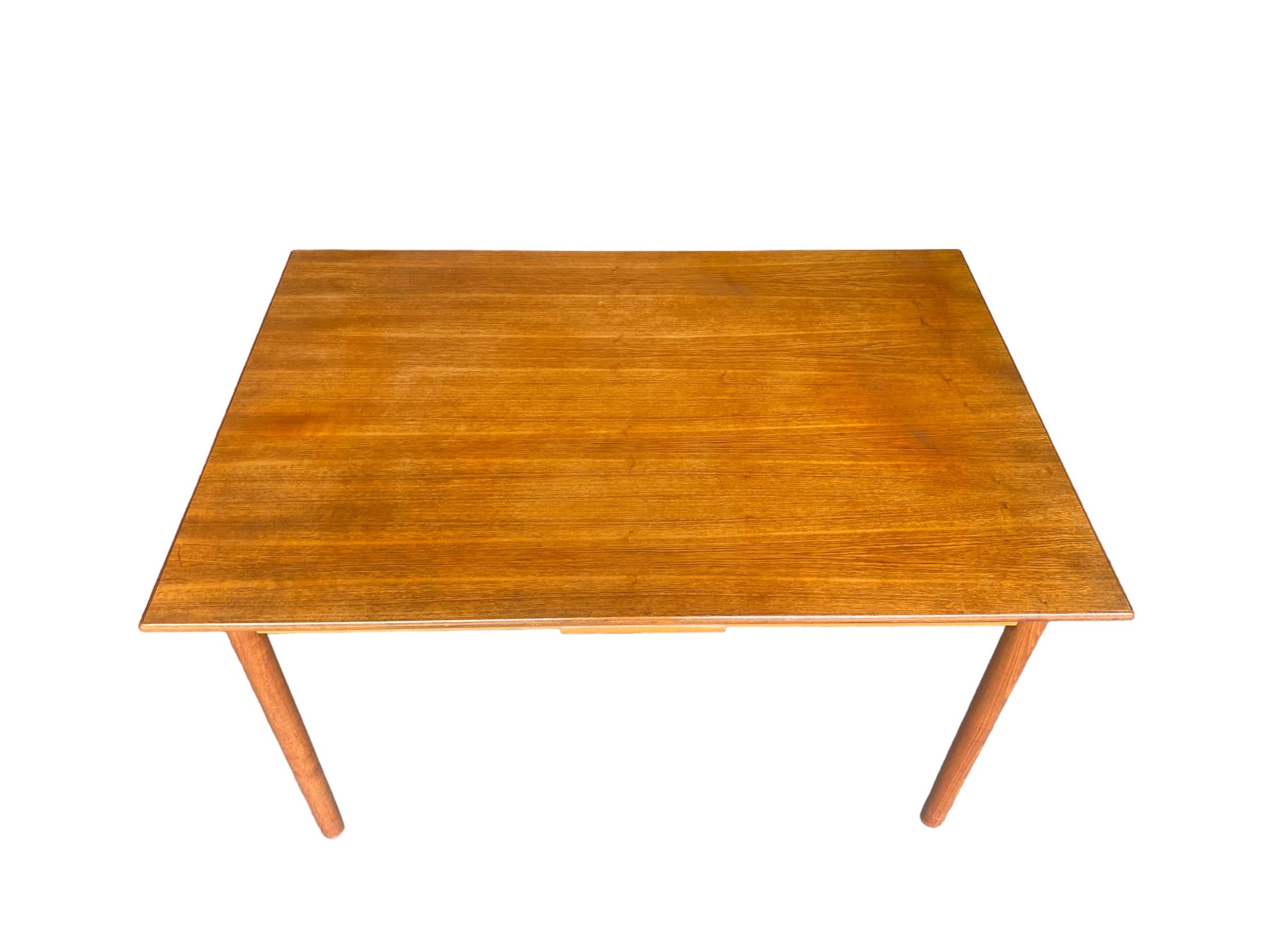 20th Century Danish Modern Teak Draw Leaf Dining Table For Sale