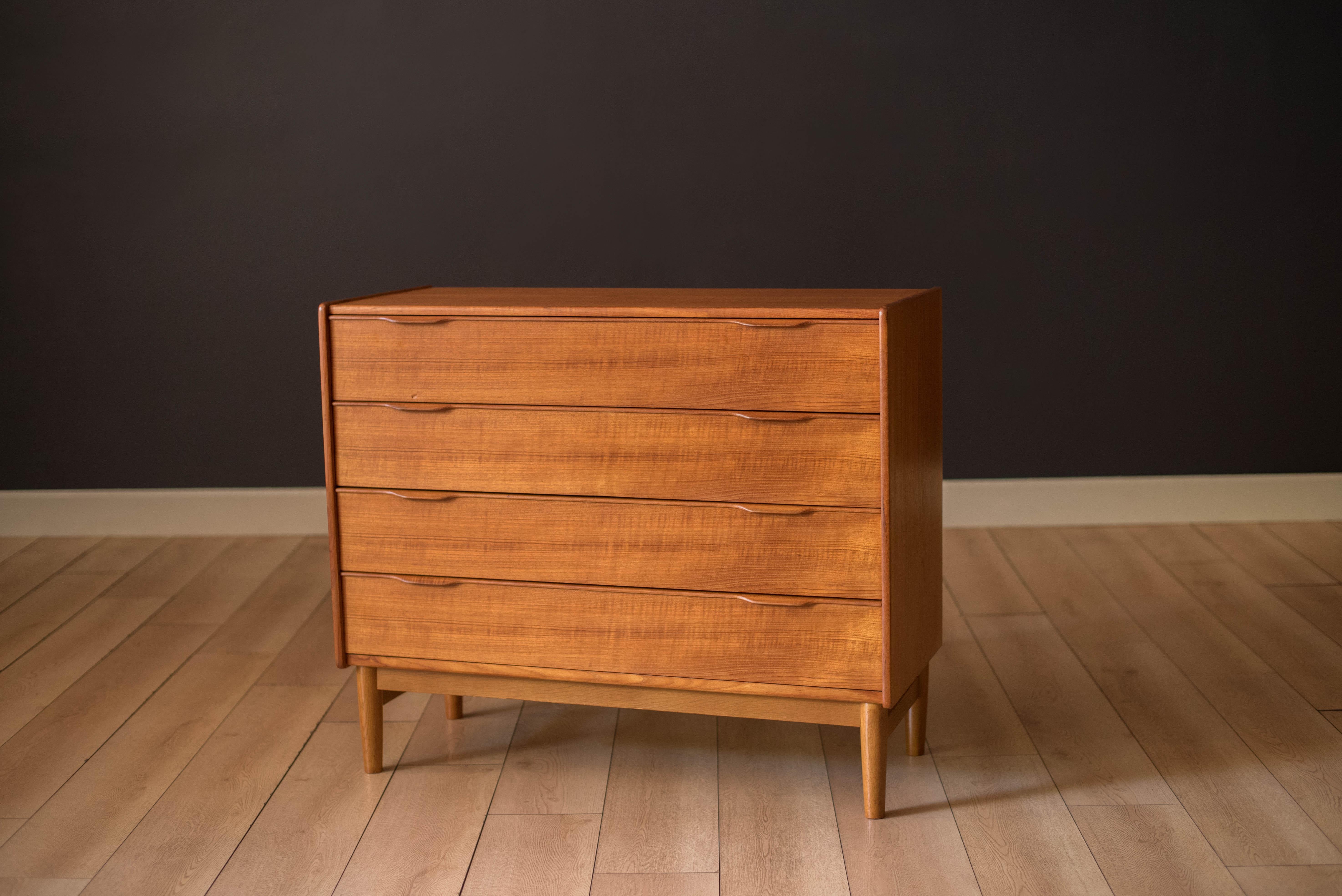 Vintage Danish chest of drawers in teak designed by Henning Jørgensen for Fredericia Møbelfabrik, Denmark circa 1960s. This unique low profile chest of drawers is perfect to use as an entryway piece or bedroom dresser. Includes four dovetail storage