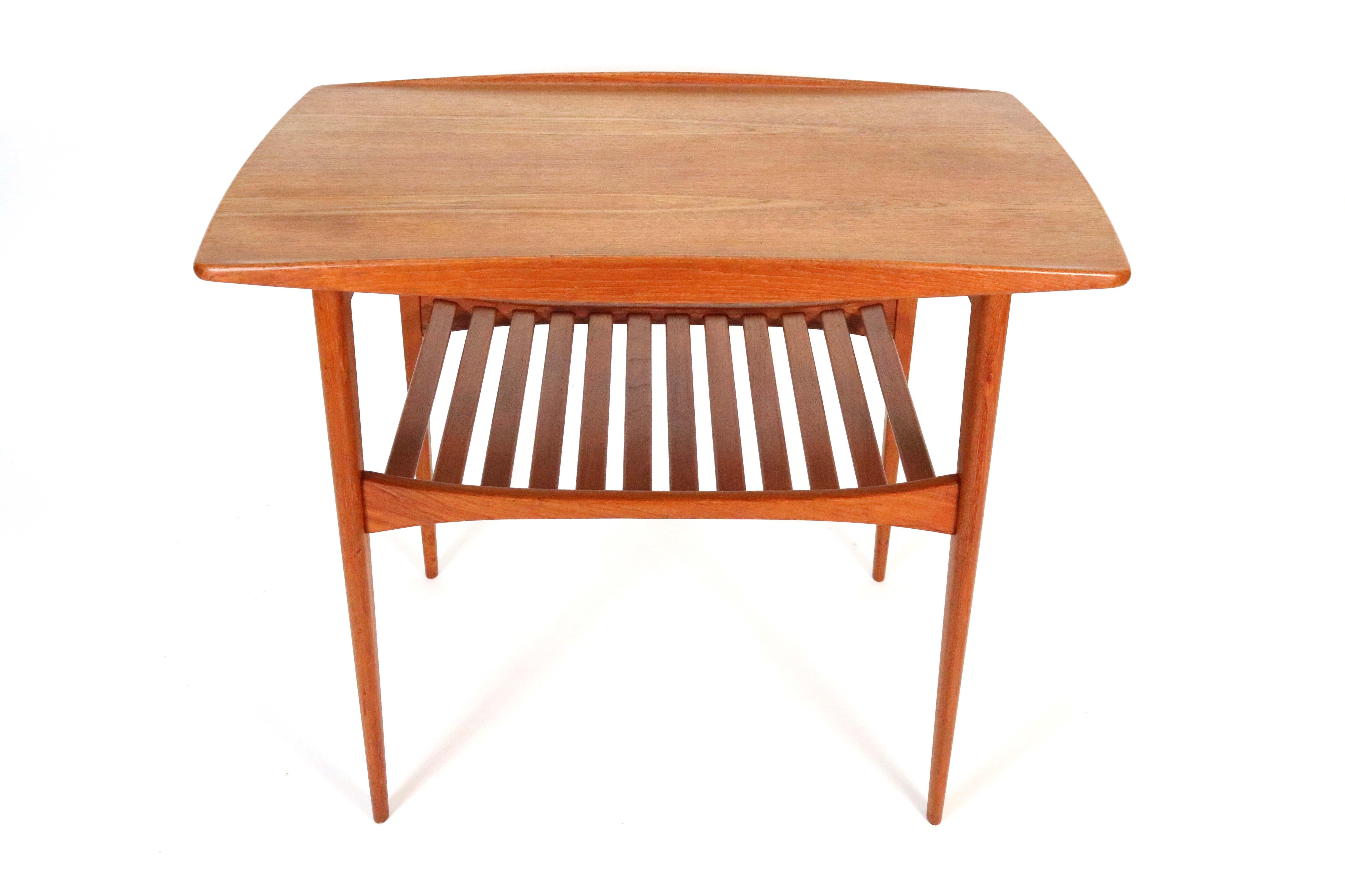 A handsome 1963 teak side table by Povl Dinesen.