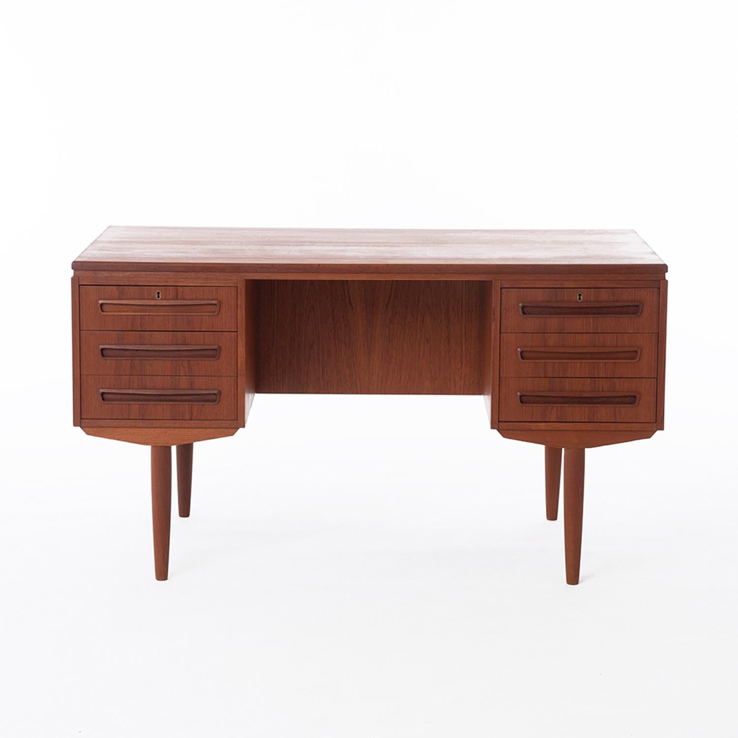 Danish modern teak executive desk. Double pedestal with exterior bookcases and cabinet.


Professional, skilled furniture restoration is an integral part of what we do every day. Our goal is to provide beautiful, functional furniture that honors