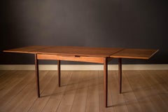 Danish Modern Teak Expandable Draw Leaf Dining Table