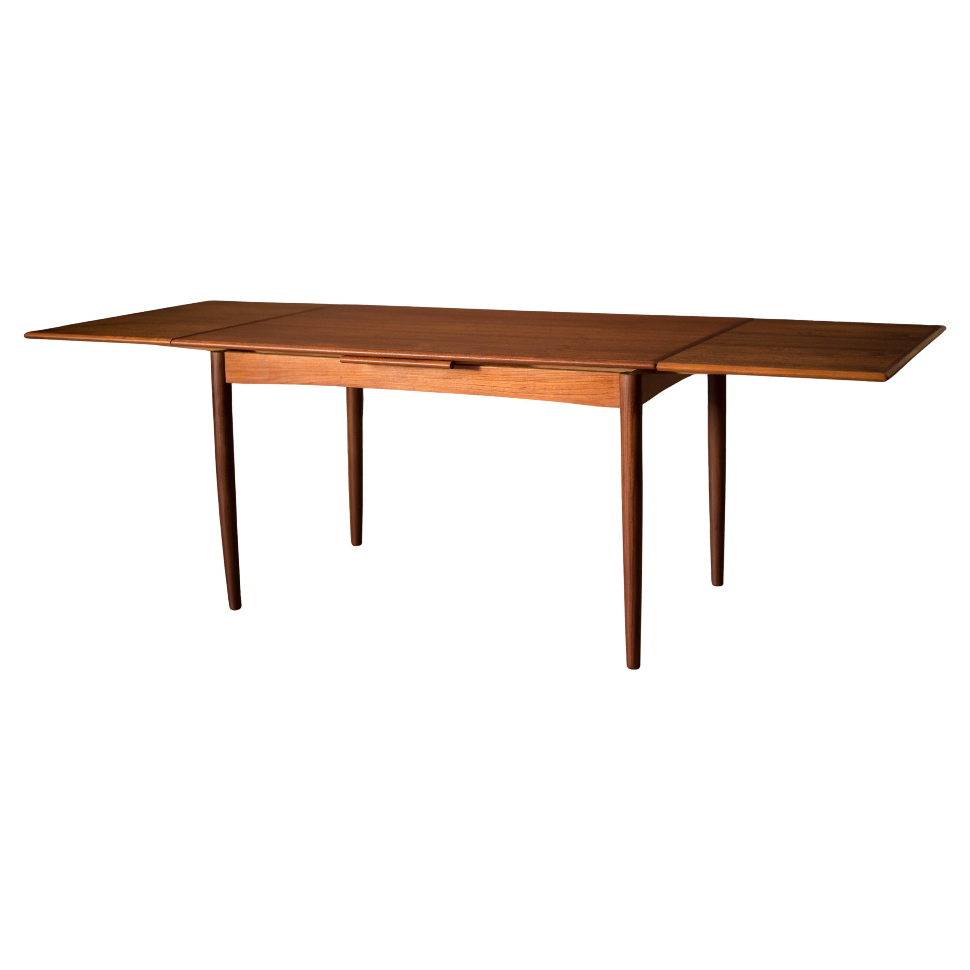 Danish Modern Teak Expandable Draw Leaf Dining Table For Sale