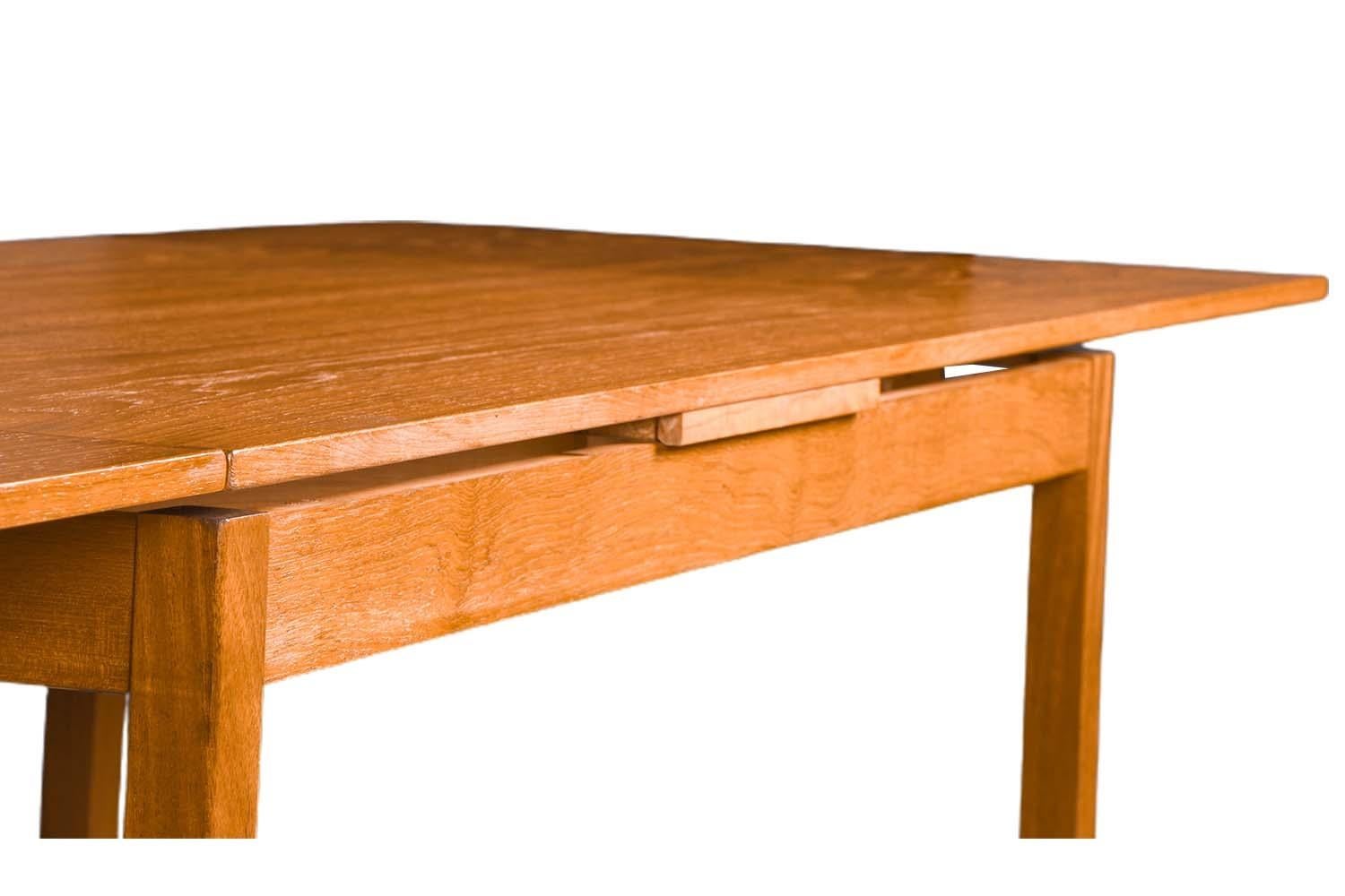 Mid-20th Century Danish Modern Teak Extendable Dining Table For Sale
