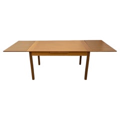 Mesa de comedor extensible de teca de estilo moderno danés con dos alas, fabricada en Dinamarca