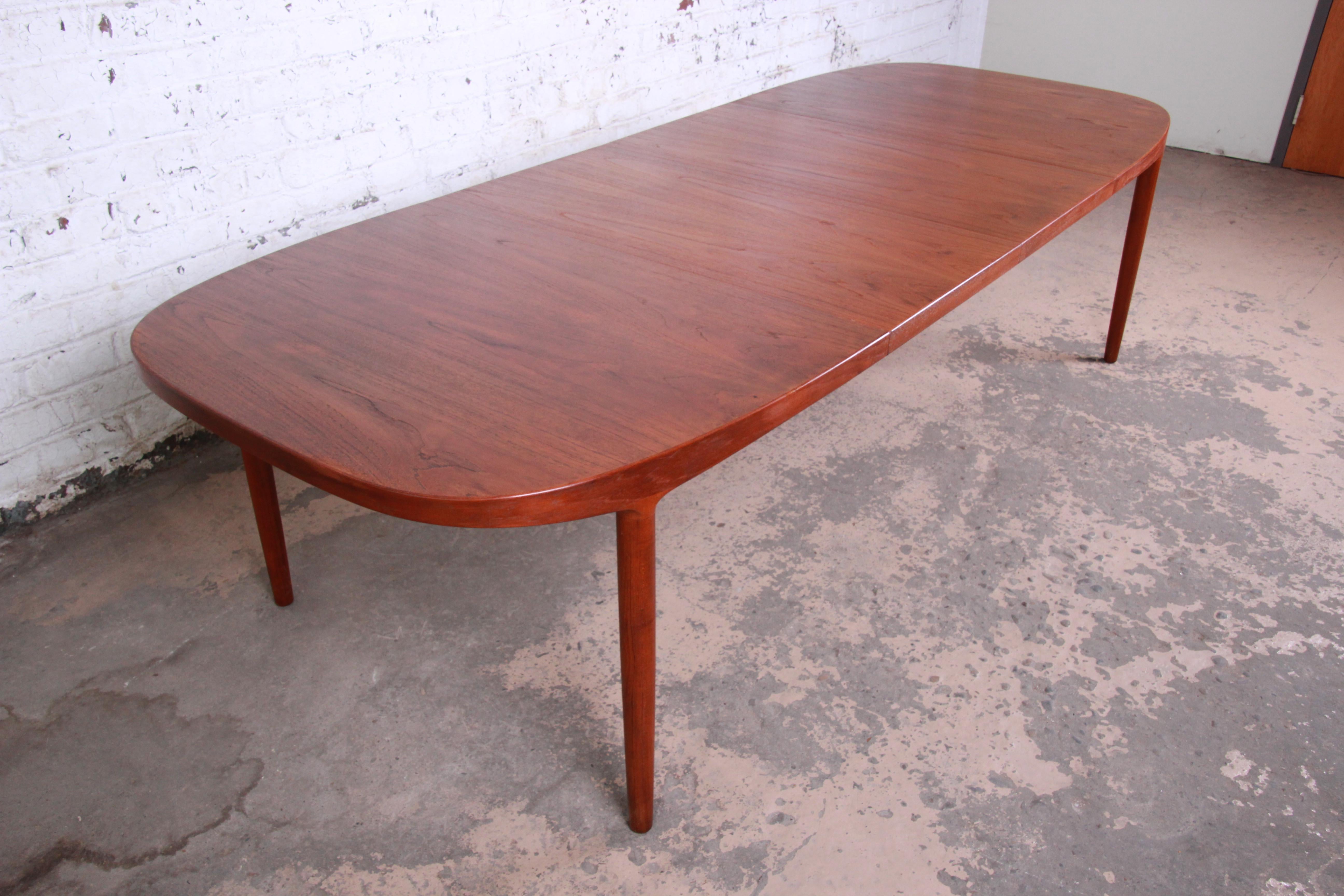 Danish Modern Teak Extension Dining Table by Harry Ostergaard, 1960s In Good Condition In South Bend, IN