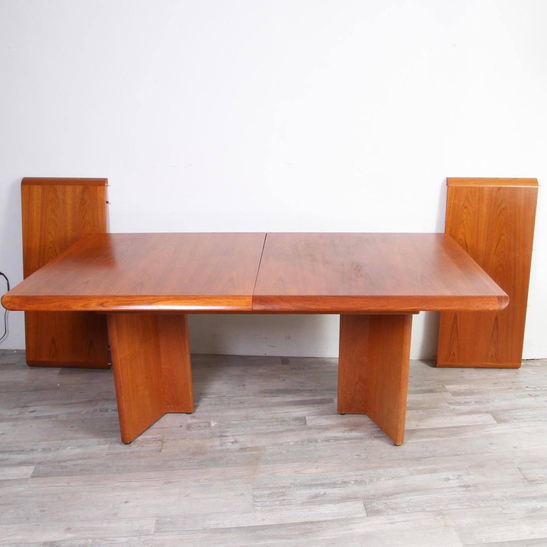 Nice modern twist on the Mid-Century Modern teak dining table. Great contemporary lines that earlier danish designs didn't have. Table measures 70