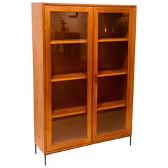 Danish Modern Teak Glass Bookcase by Dyrlund on Solid Iron Base