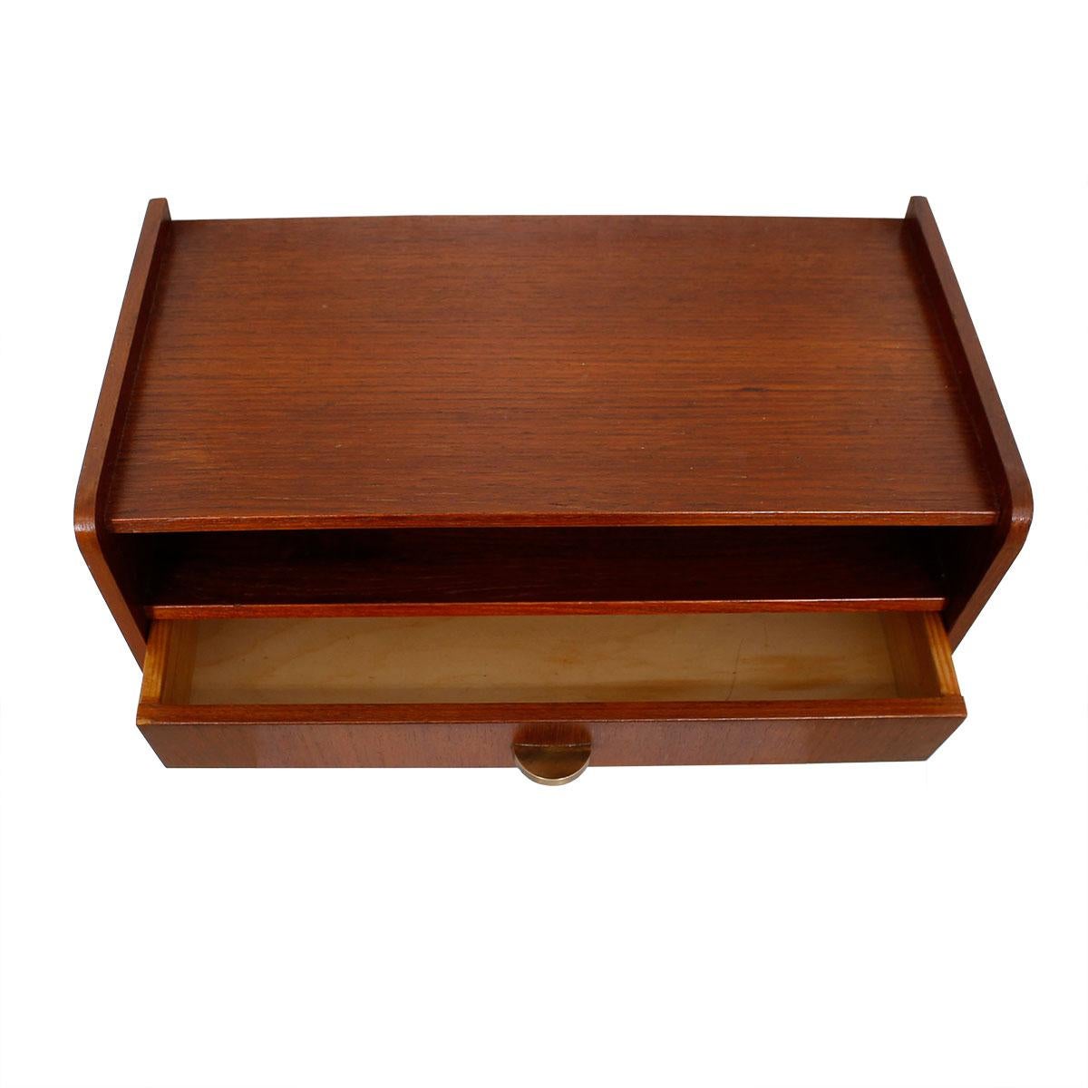 Beautiful Teak Wall Mounted Shelf with Cubby Storage and Drawer — Minimalism at Its Best. Drawer has a lovely half-moon brass pull. Use it as a nightstand for an uncluttered look. Perfect in an entryway with a mirror mounted above.