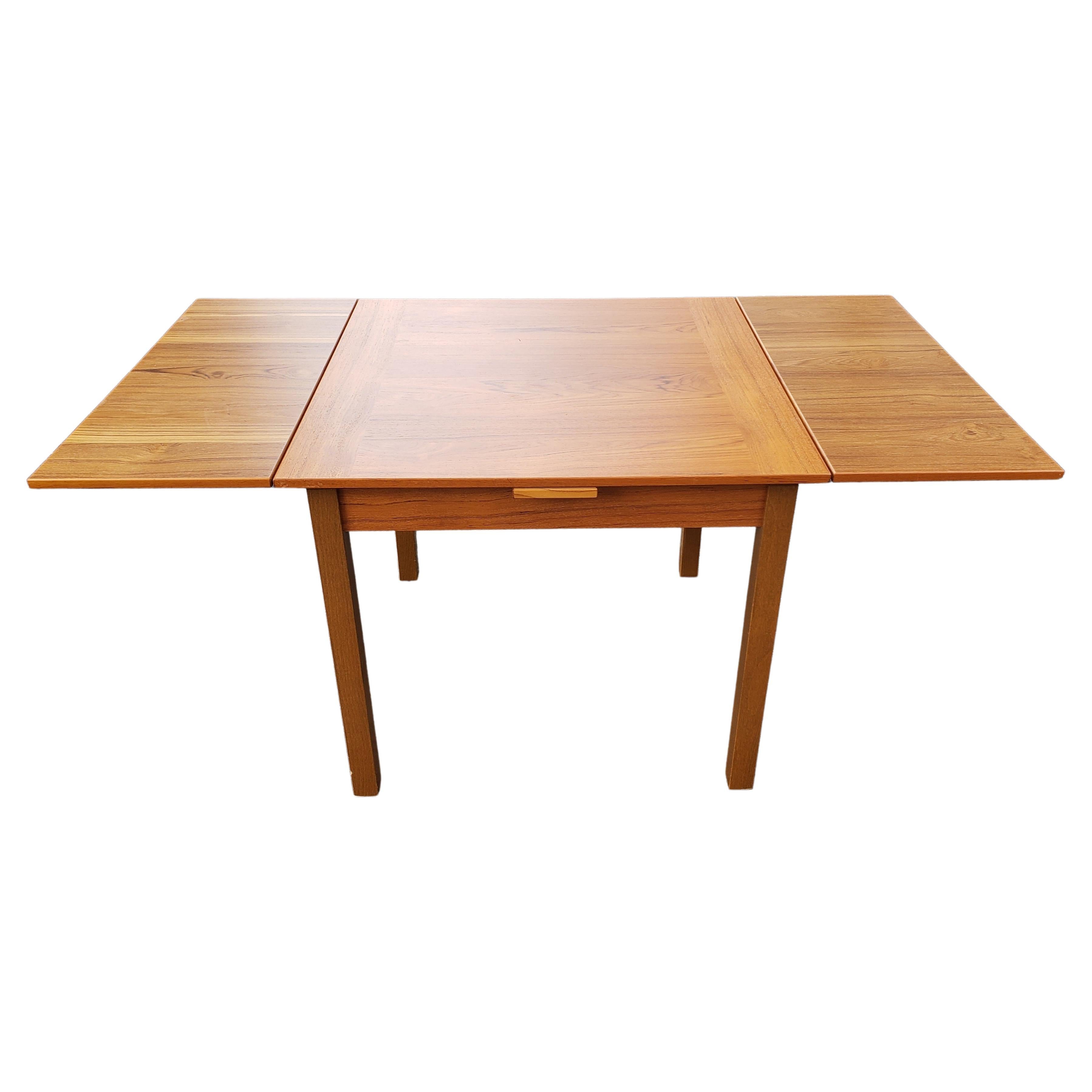 Contemporary Danish Modern Teak Hidden Leaves Expandable Dining Table 