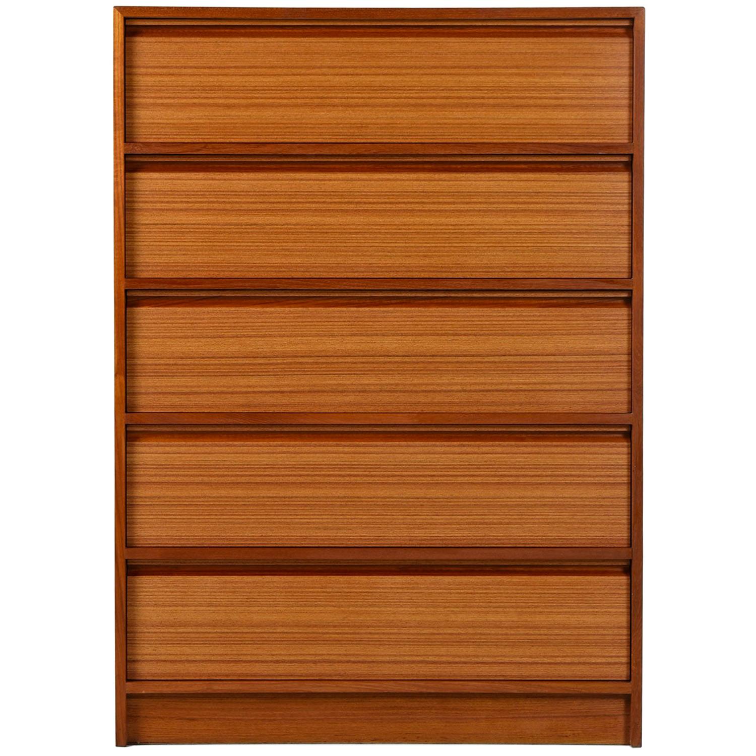 Expertly crafted midcentury Scandinavian Modern Danish teak highboy dresser. This chest of drawers is an exemplary specimen of Danish cabinet making. Tightly dovetailed drawers, beautiful teak wood and easy gliding drawers are hallmarks of the