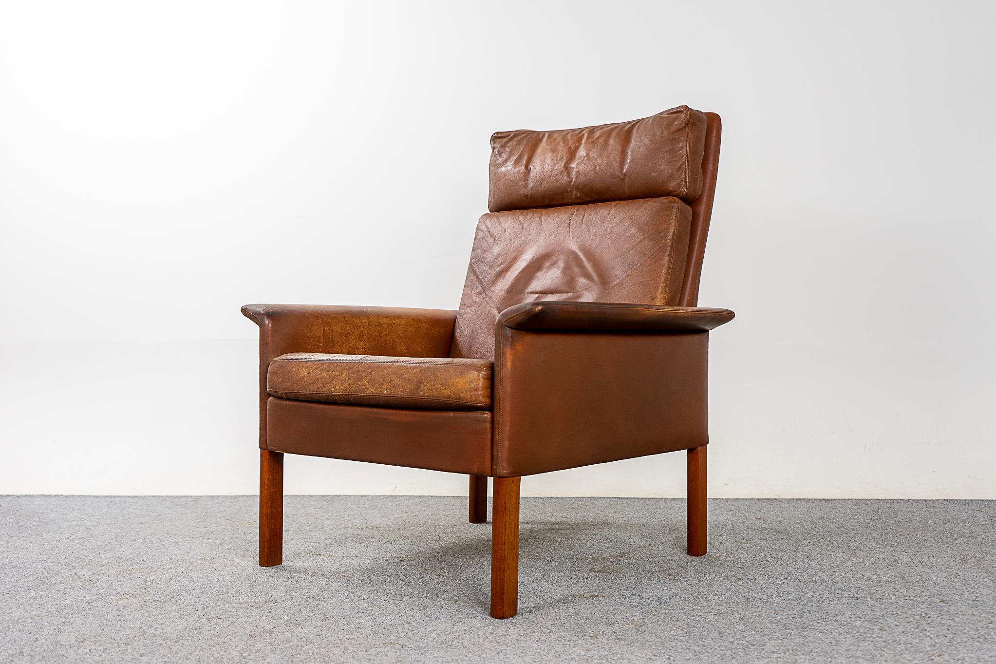 Leather Danish high back lounge chair, circa 1960's. Lovely lines, high back provides support for your neck. Highly patinaed leather. 

Unrestored item, some marks consistent with age.

Please inquire for international shipping rates.