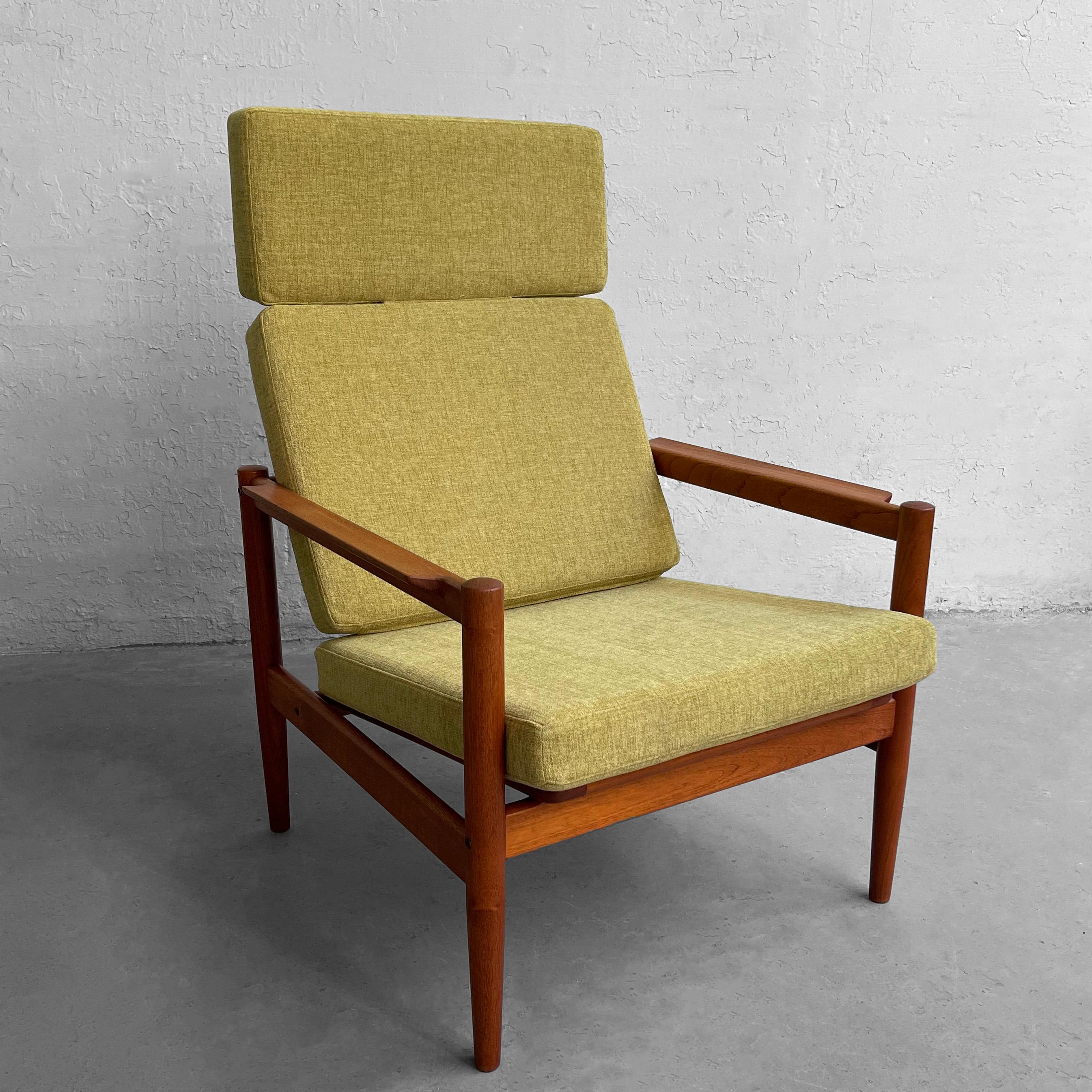 Danish modern, high back, lounge chair by Borge Jensen, Borge Jensen & Sonner features a teak frame with slat back and newly upholstered, segmented cushions in chartreuse chenille.
