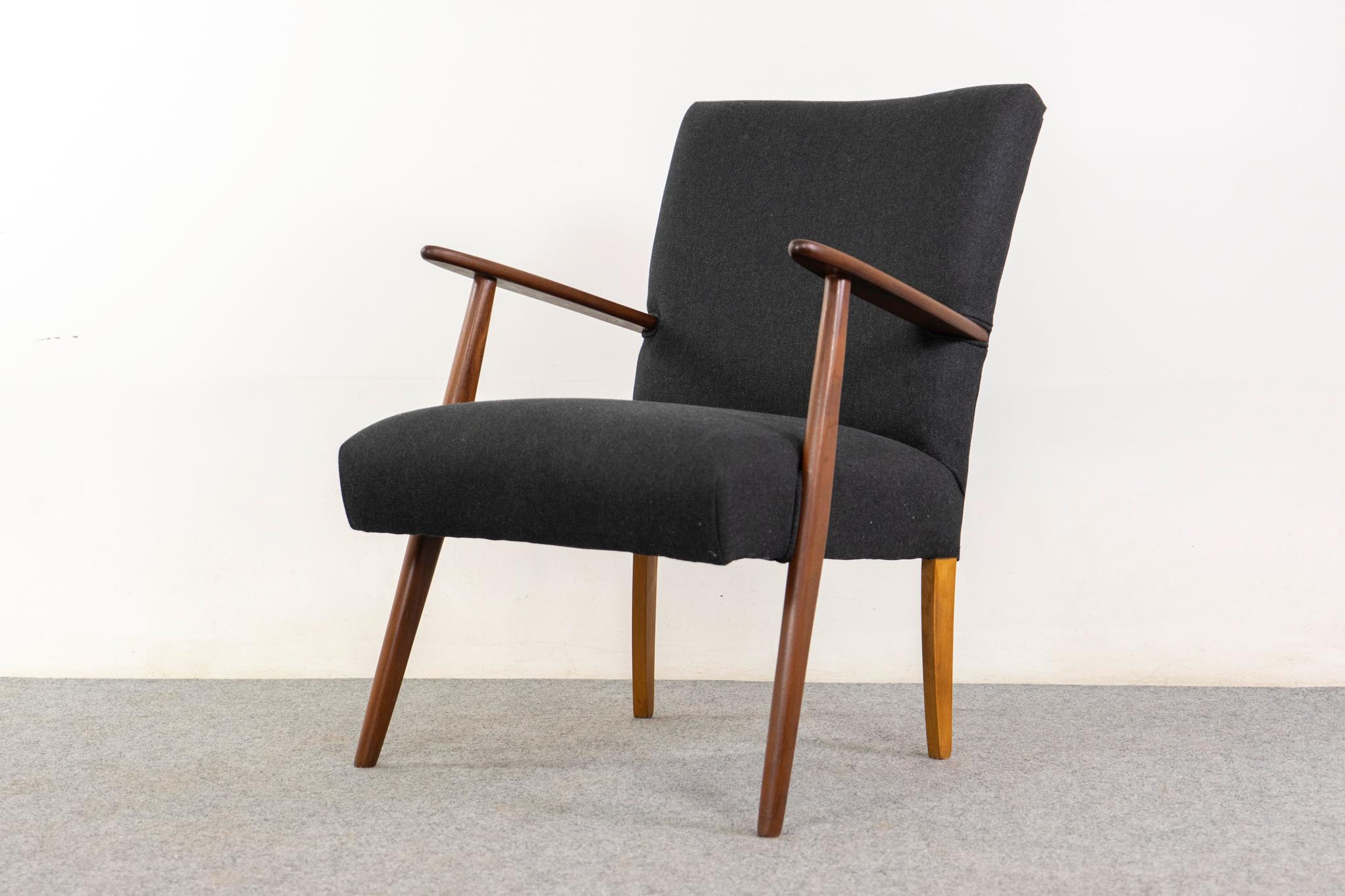 Teak Danish lounge chair, circa 1960s. Robust frame with modern, simple lines. Newly  upholstered in textured, dark charcoal wool.    