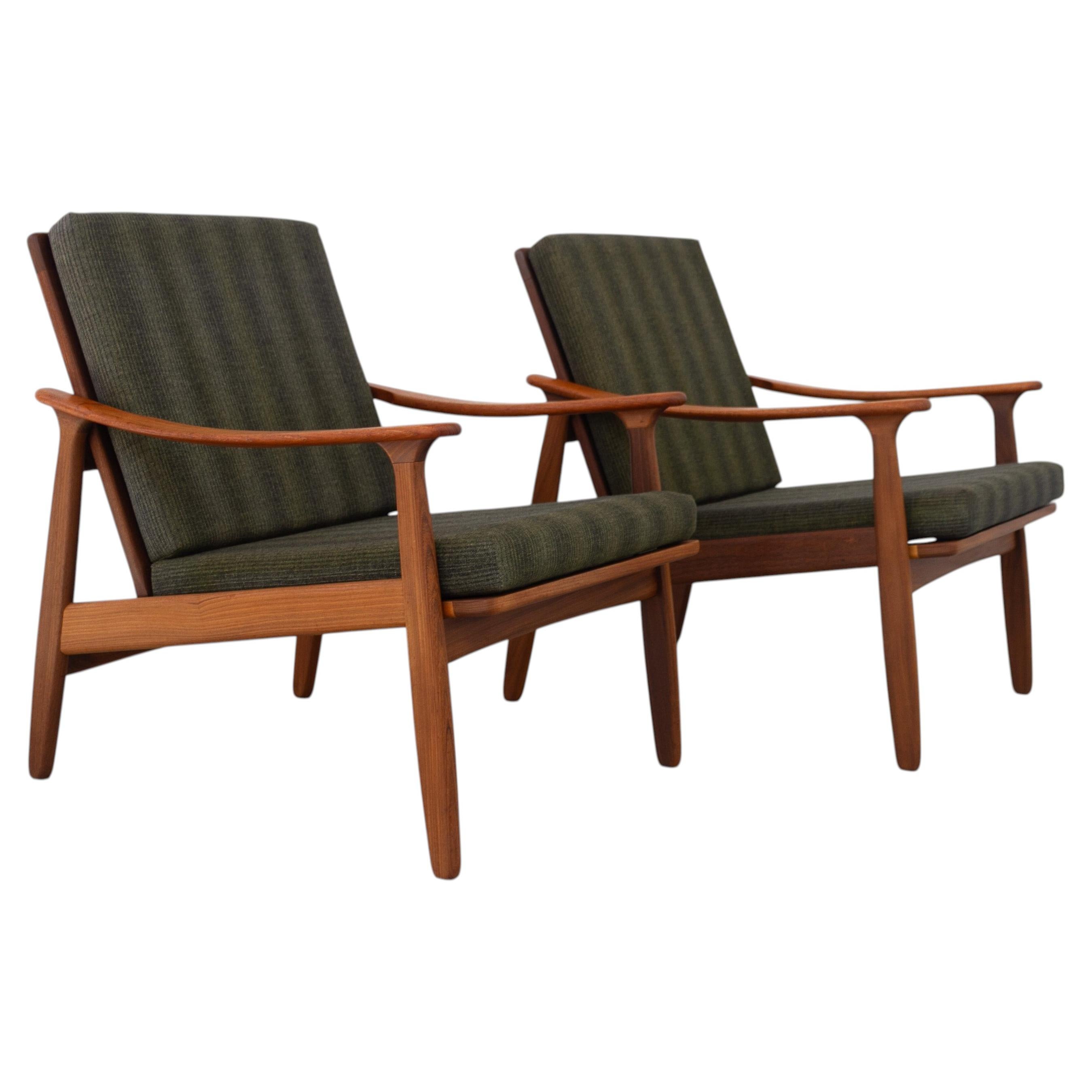 Sillones de teca de estilo moderno danés, década de los 60. Juego de 2. en venta