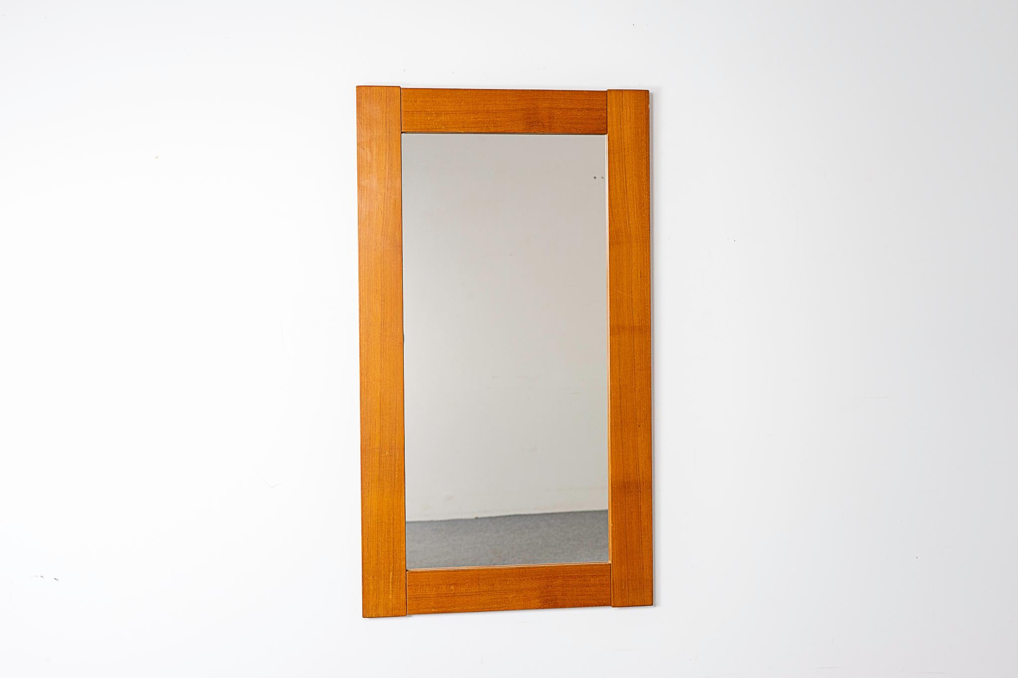 Teak mid-century mirror, circa 1960's. Clean modern design, enjoy it in any room in the home. Minor marks consistent with age.