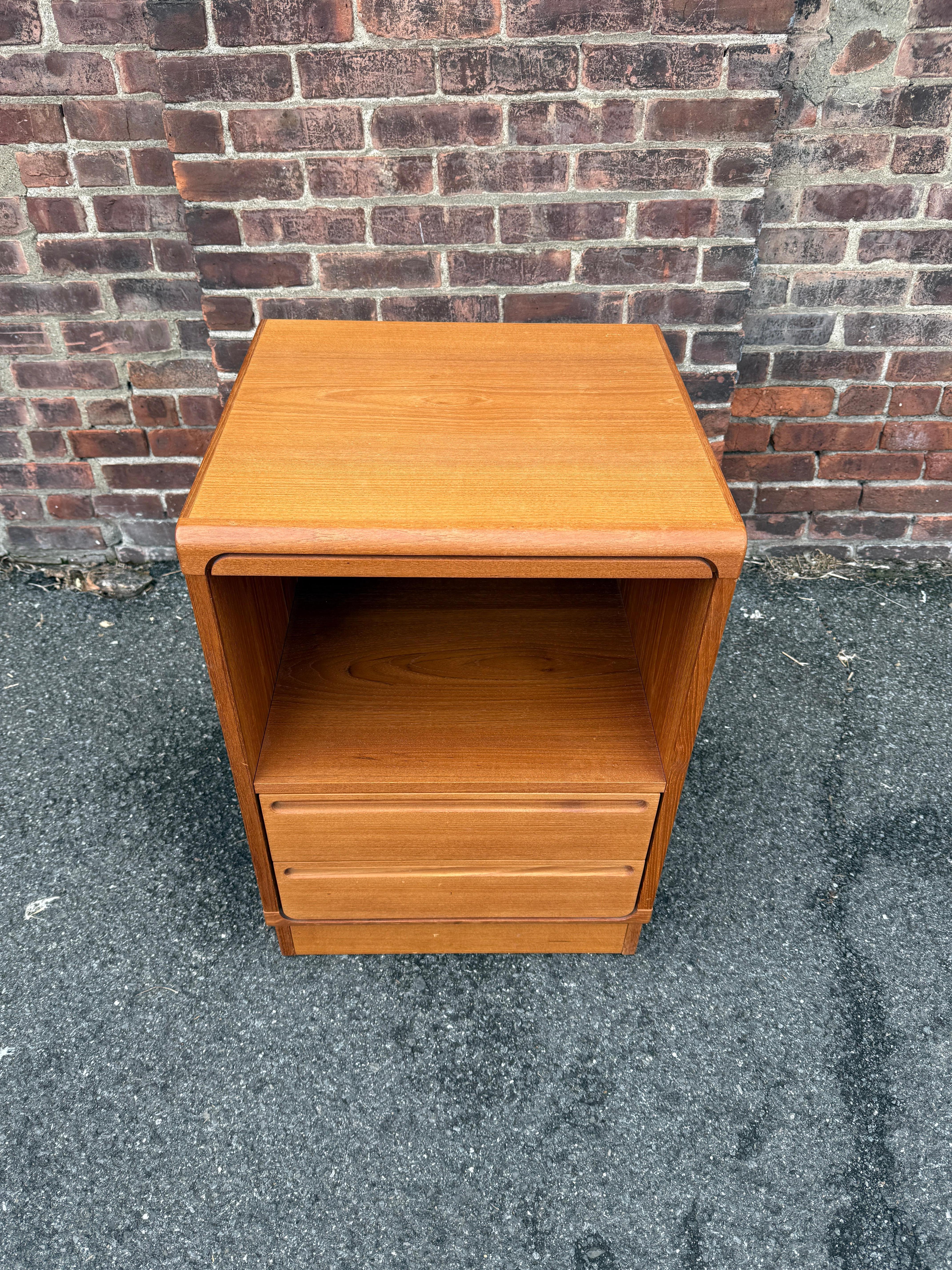 (1) Danish Modern Teak Nightstand by Nils Jonsson for Torring Mobelfabrik. The Nightstand is very nicely fabricated with high end woodworking. Original labeled with 2 lower drawers. All drawers are very clean inside and out and the drawers are