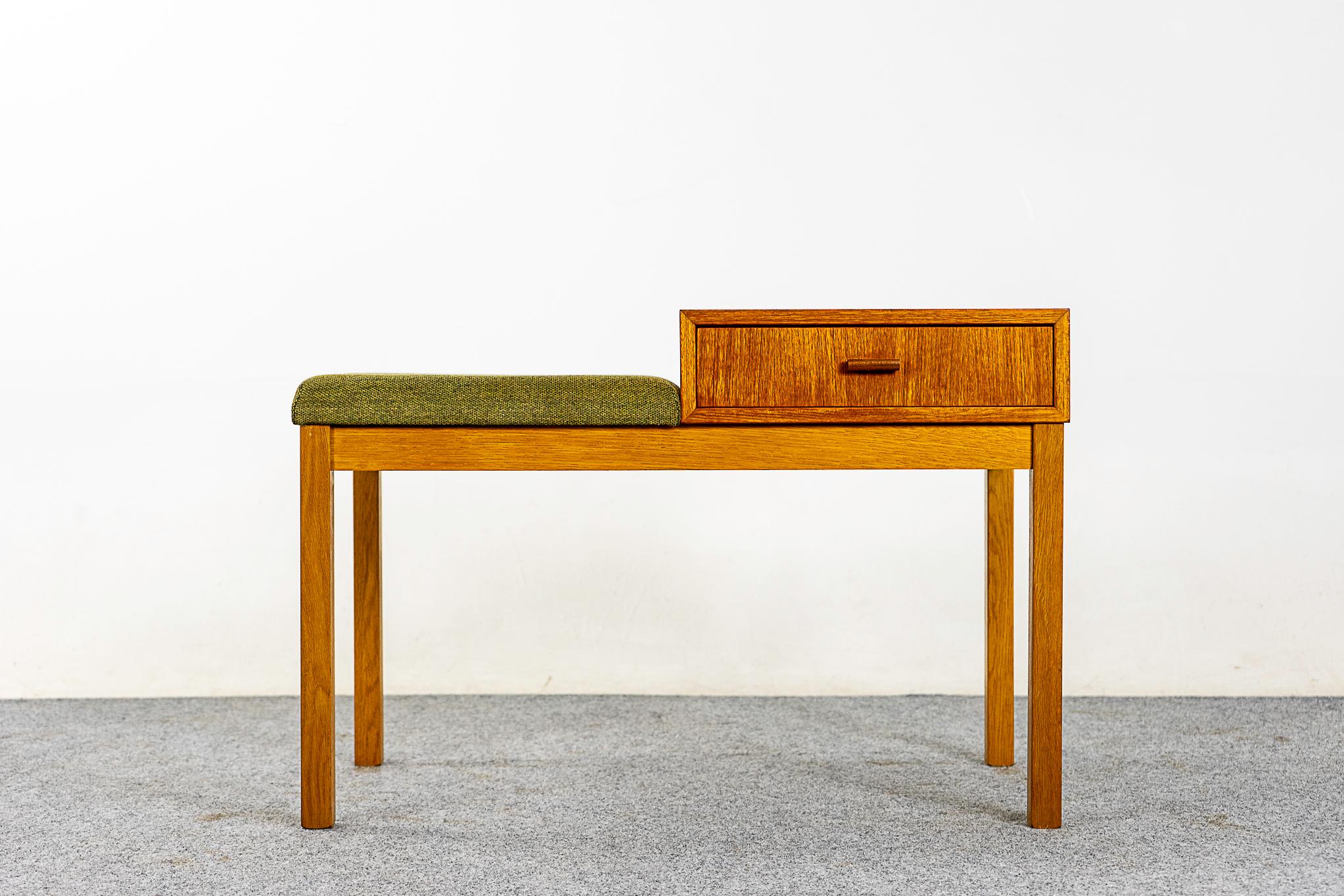 Teak & oak Mid-Century Modern bench, circa 1960s. Versatile bench can have the seat on either side. Handy drawer to hide away clutter. Simple and sleek. Original upholstery with minor wear.

Original condition, minor marks consistent with