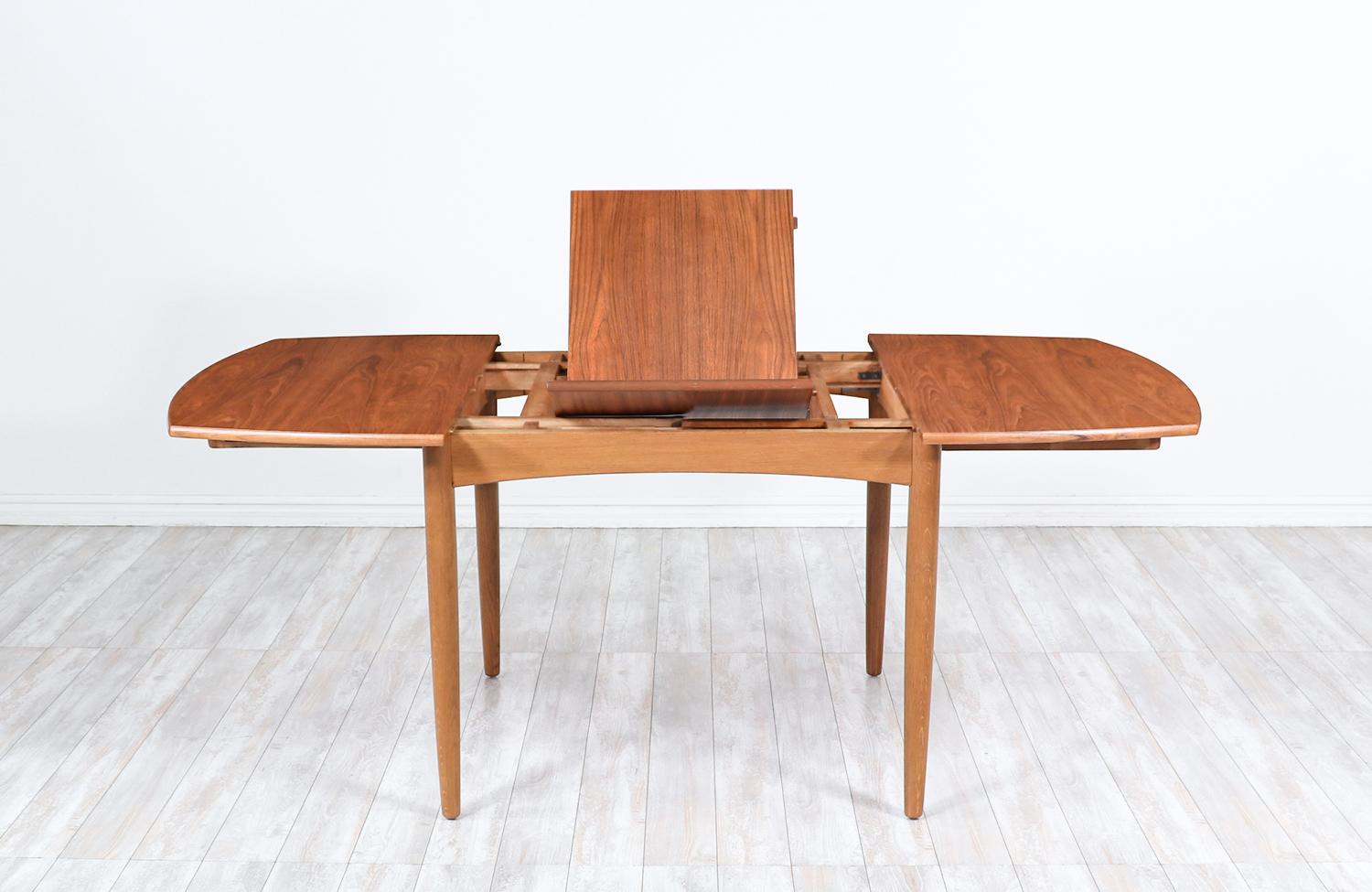 Danish Modern Teak & Oak Butterfly Leaf Dining Table In Excellent Condition In Los Angeles, CA