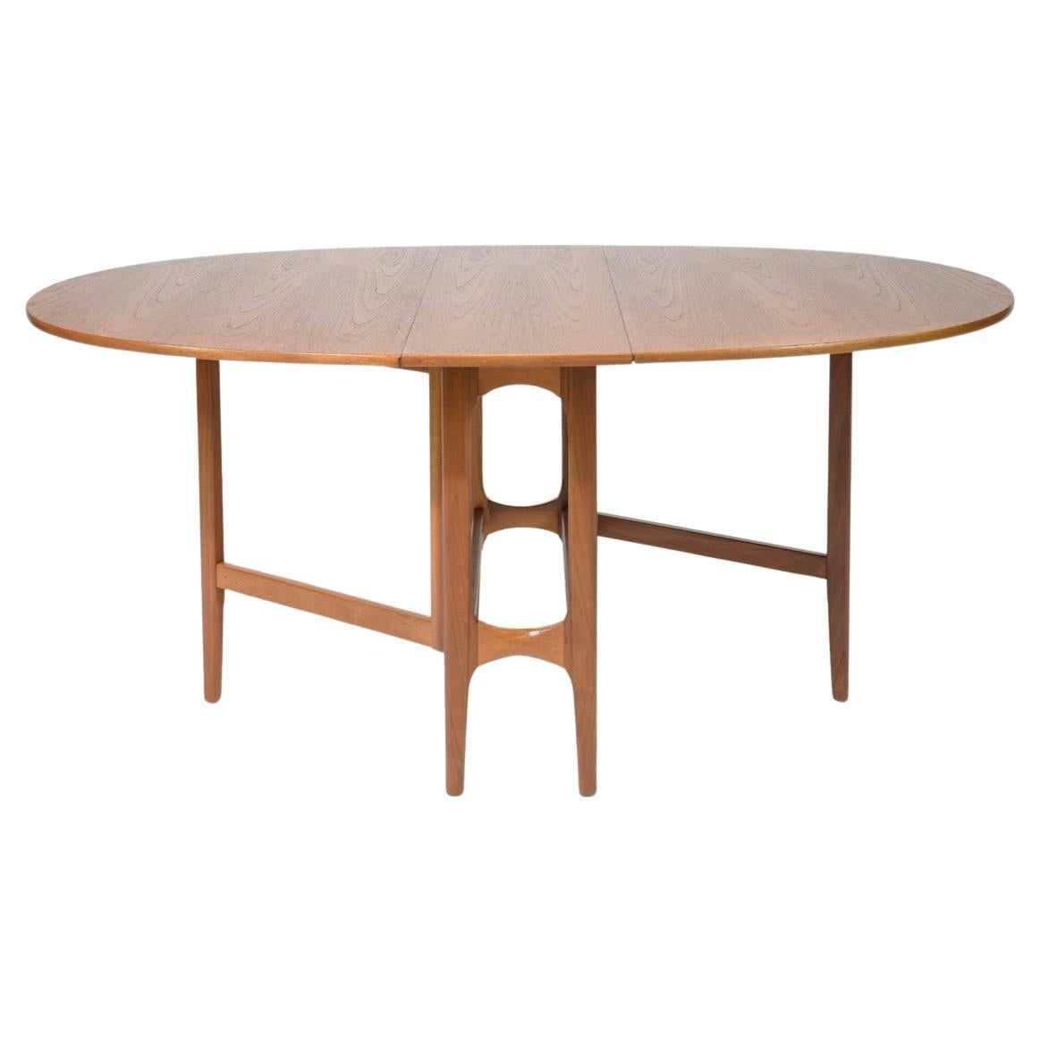 Danish modern teak oval folding dining table  For Sale
