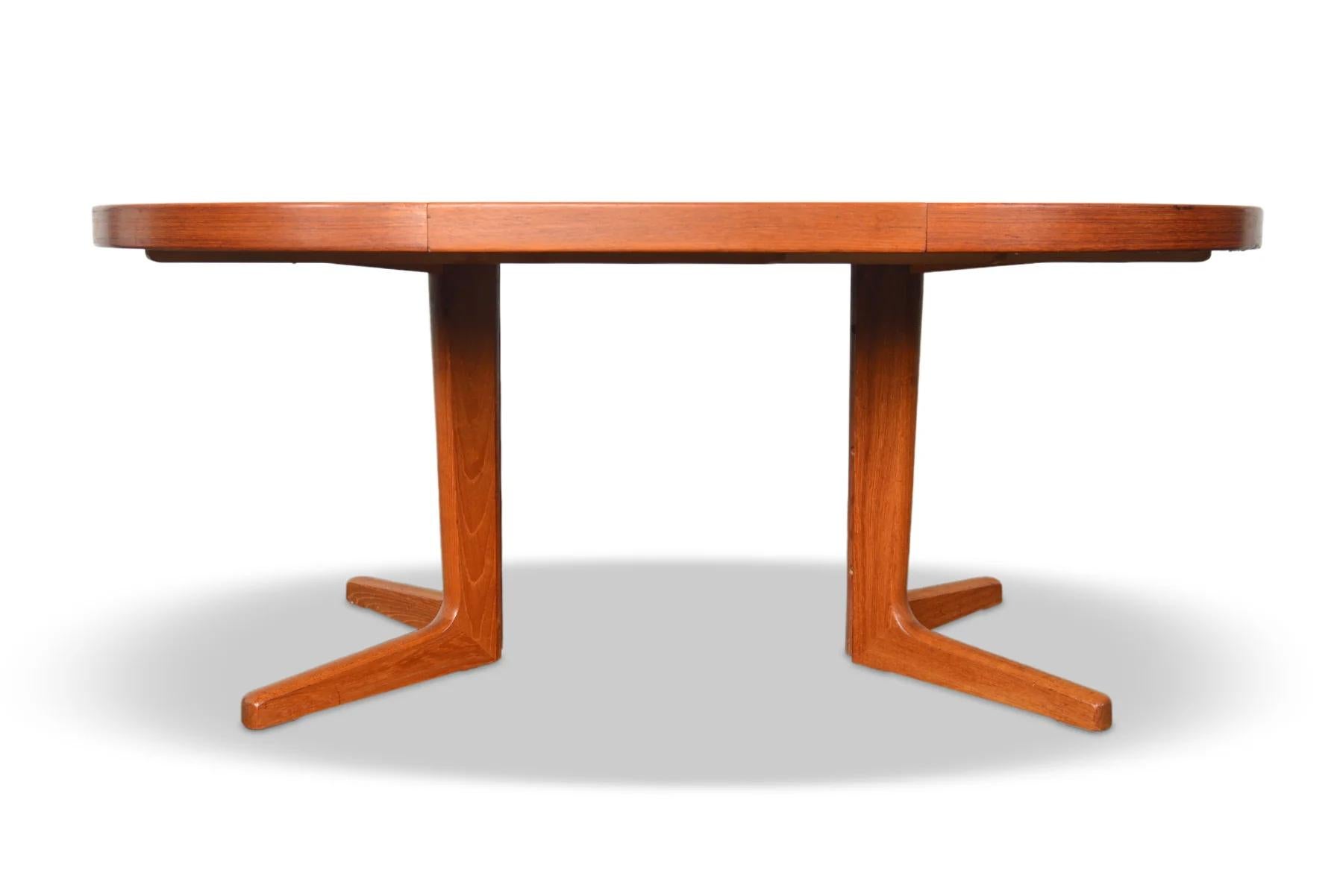 Danish Modern Teak Pedestal Dining Table With One Leaf 1