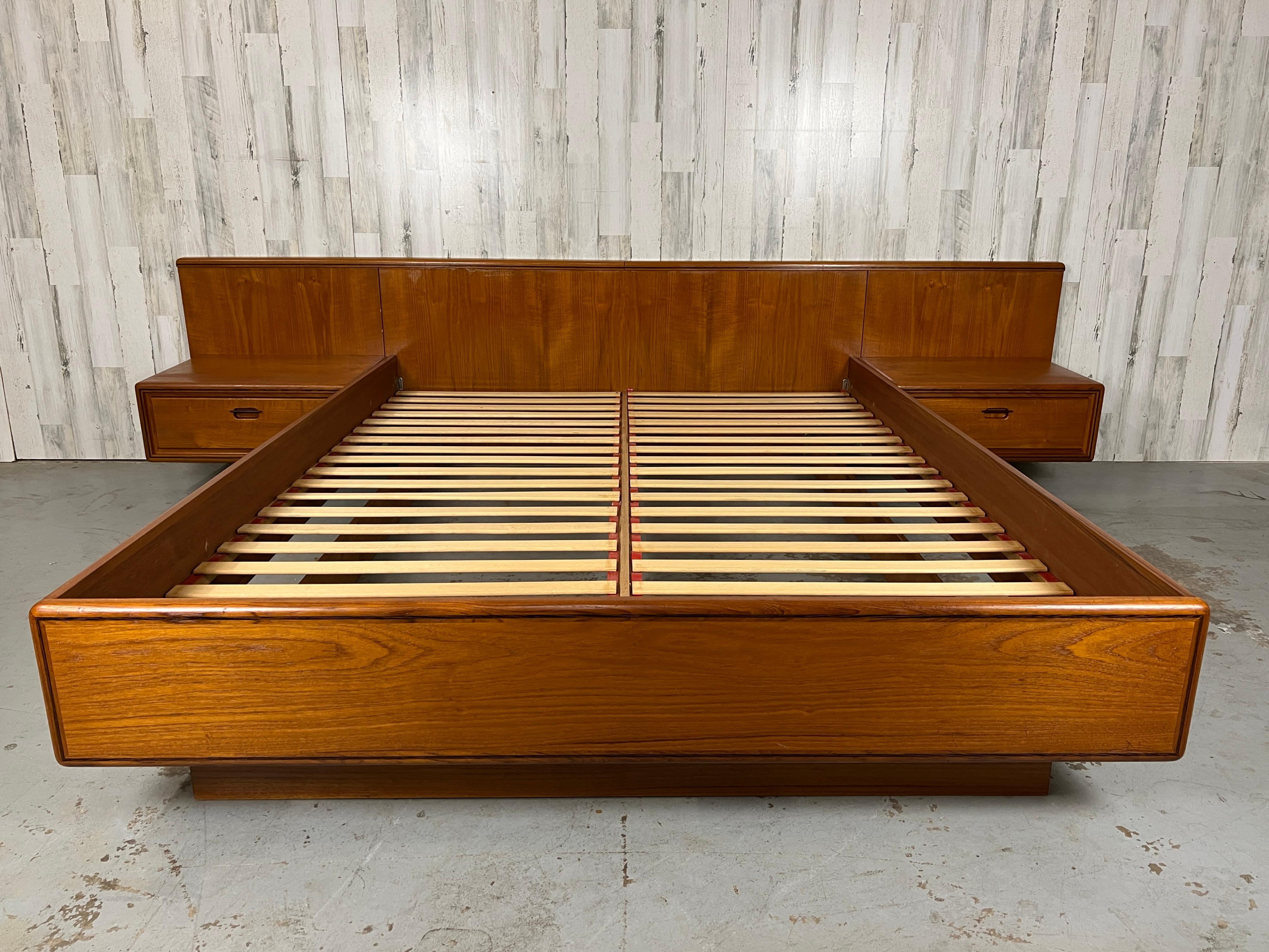 Teak platform floating bed & nightstands queen sized. Teak railing, headboard, and nightstands with sculpted wood drawer pulls. 

Each nightstand: 25 L x 18.5 D x 9.75 H
Floor to rail: 15.5 H.
