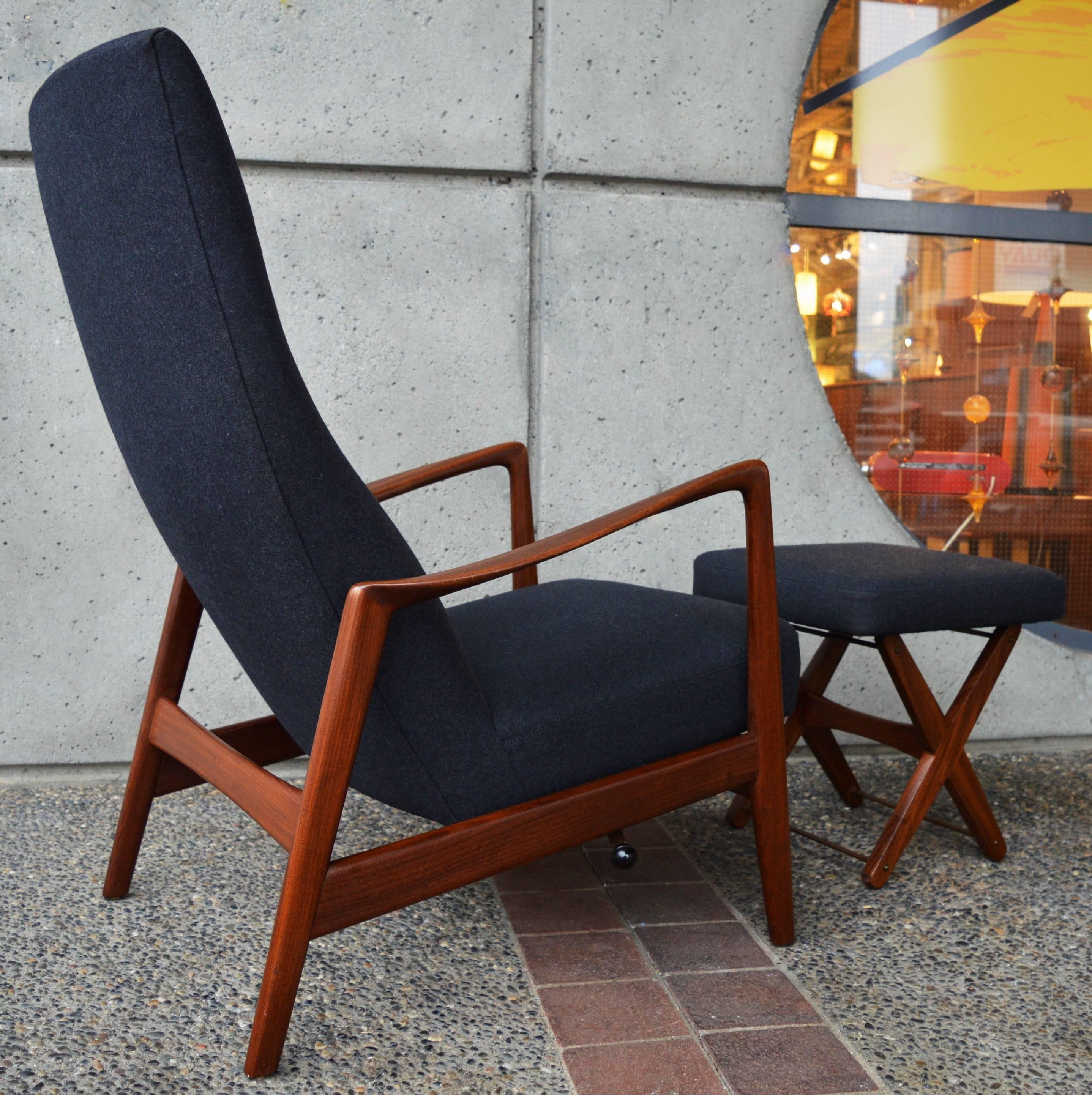 This totally gorgeous Danish modern teak frame tall back lounge chair is the tall persons dream chair! Lock it in an upright position, leave it unlocked and use it as a platform rocker, or use the lever on the side of the seat to pick one of several