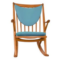 Fauteuil à bascule danois moderne en teck avec assise en cuir de Frank Reenskaug
