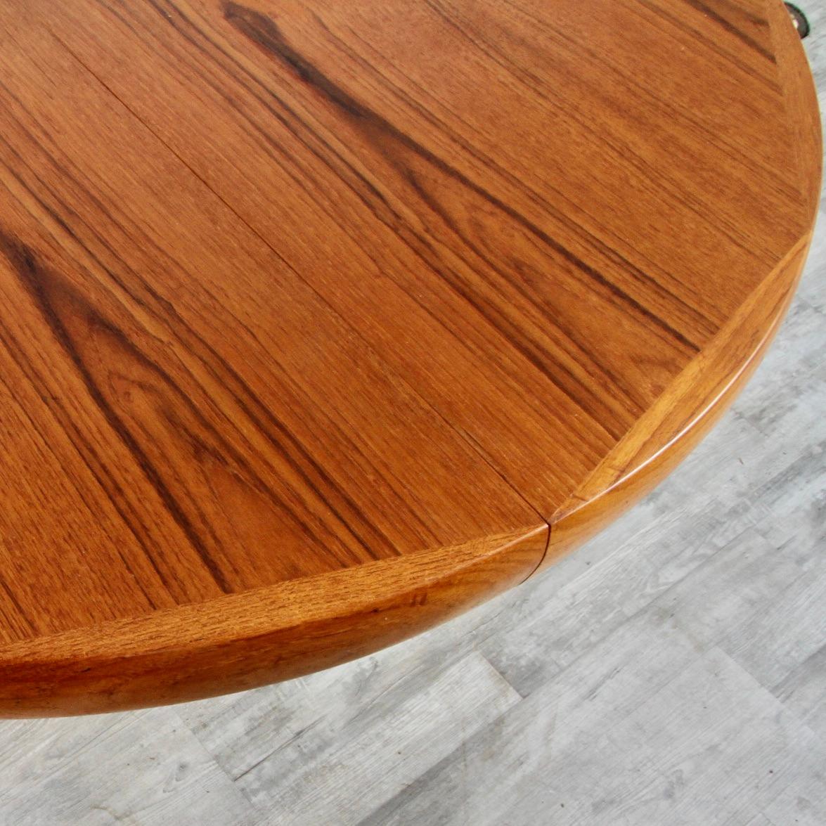 Clean teak table by Nordic Furniture of Ontario Canada. No leaves, but nice seating for 4.