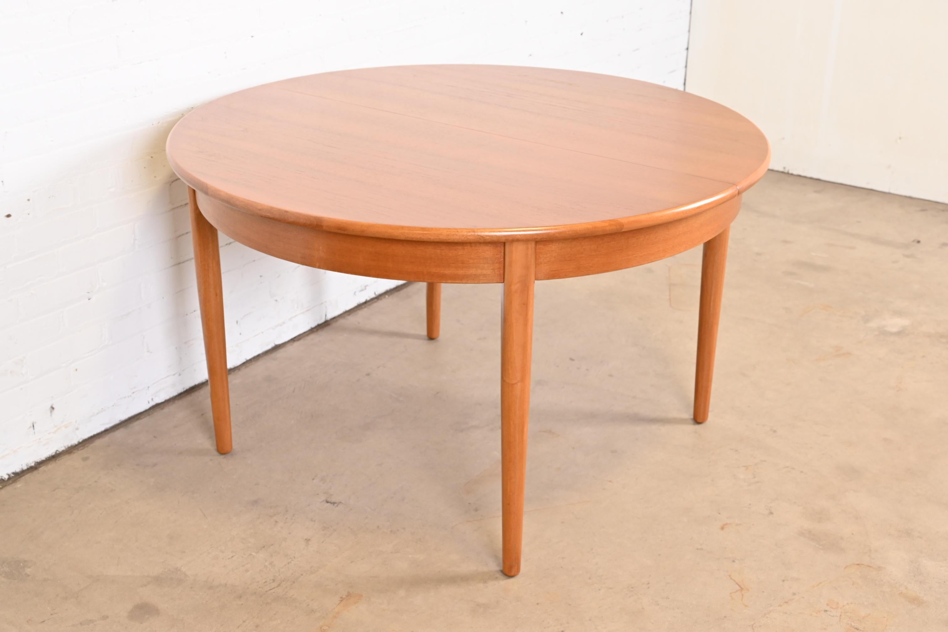 Mid-20th Century Danish Modern Teak Round Dining Table, Newly Refinished For Sale